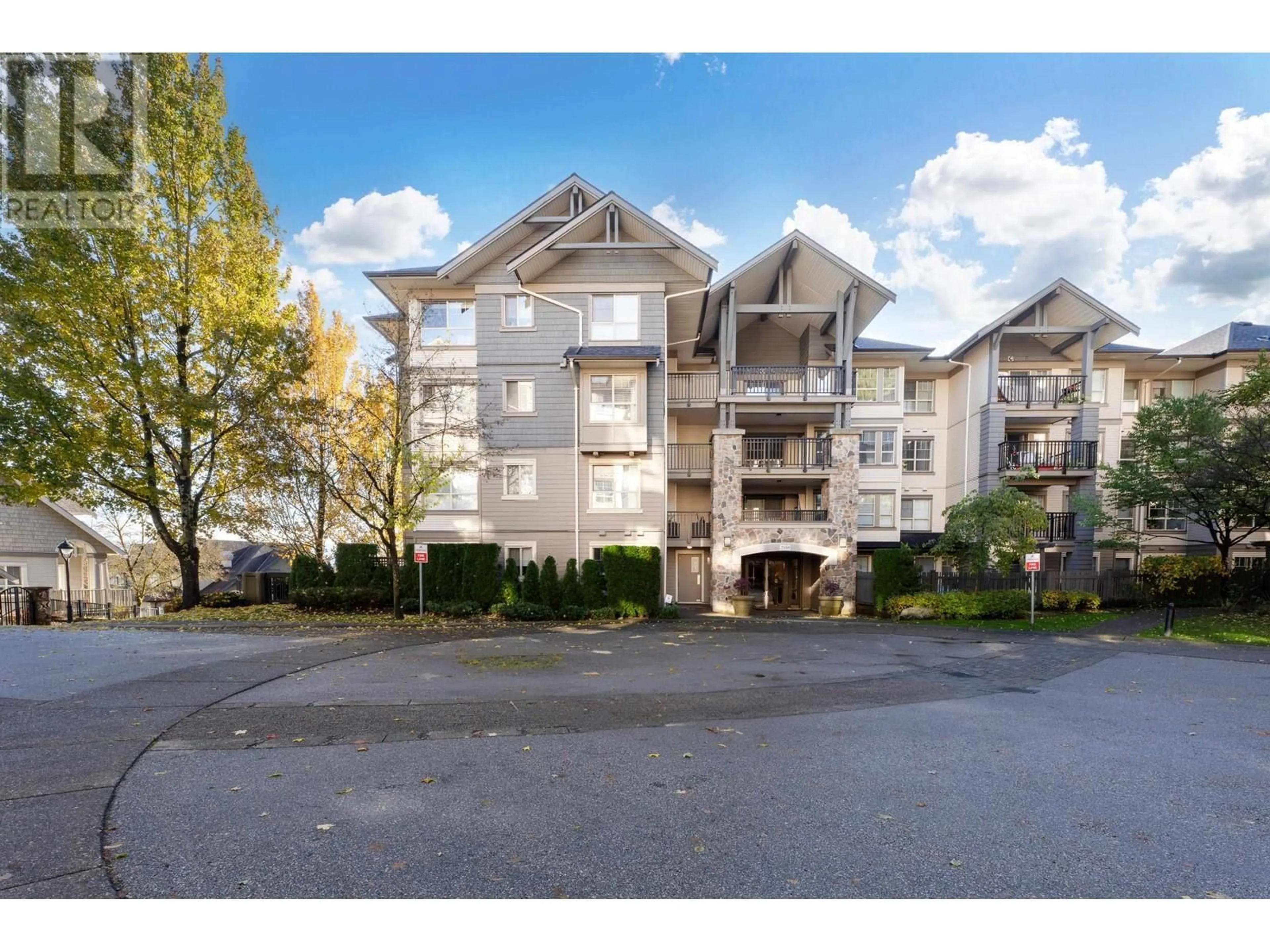 A pic from exterior of the house or condo, the front or back of building for 301 2958 WHISPER WAY, Coquitlam British Columbia V3E3S7