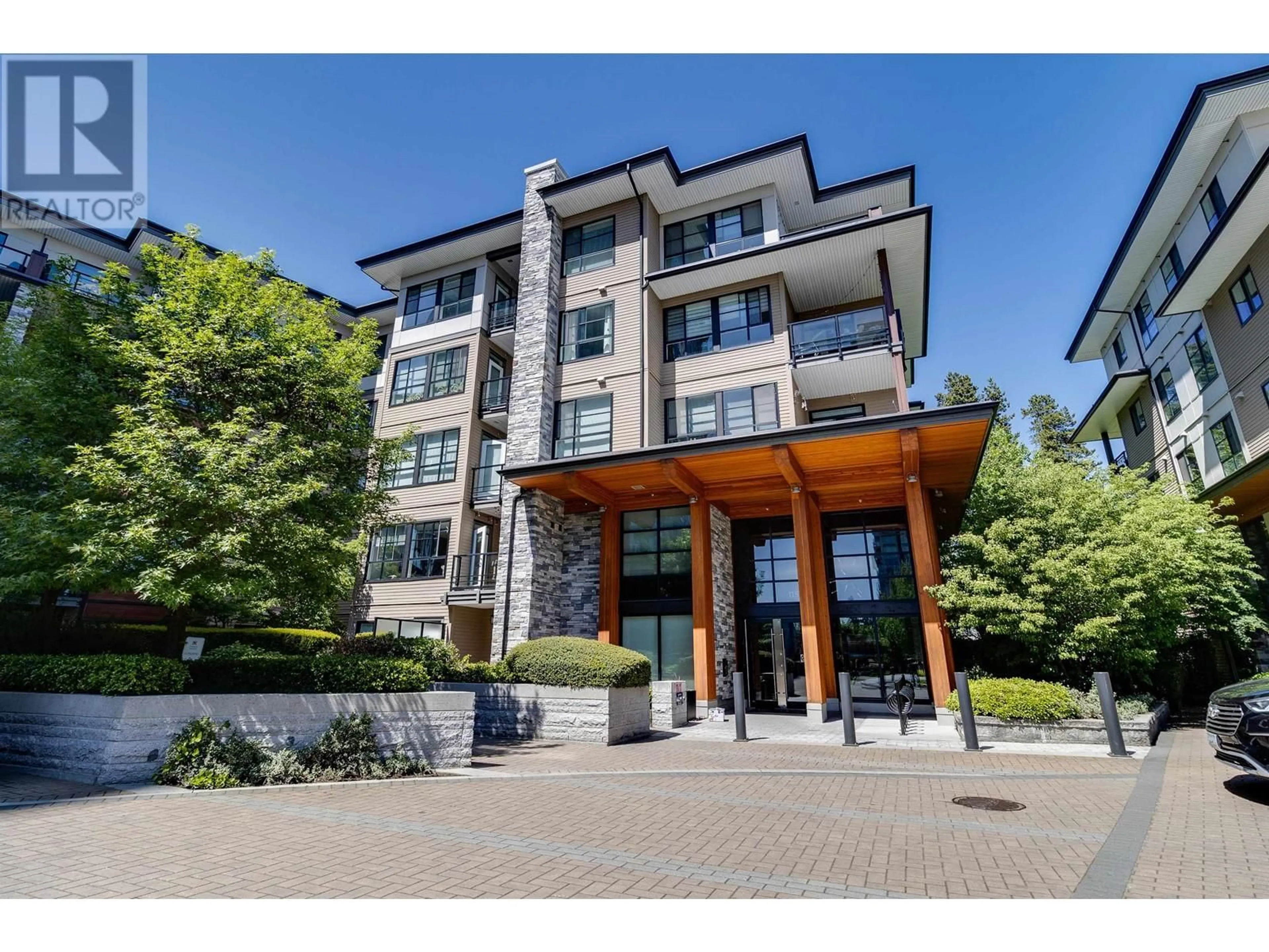 A pic from exterior of the house or condo, the front or back of building for 206 1151 WINDSOR MEWS, Coquitlam British Columbia V2B0M9