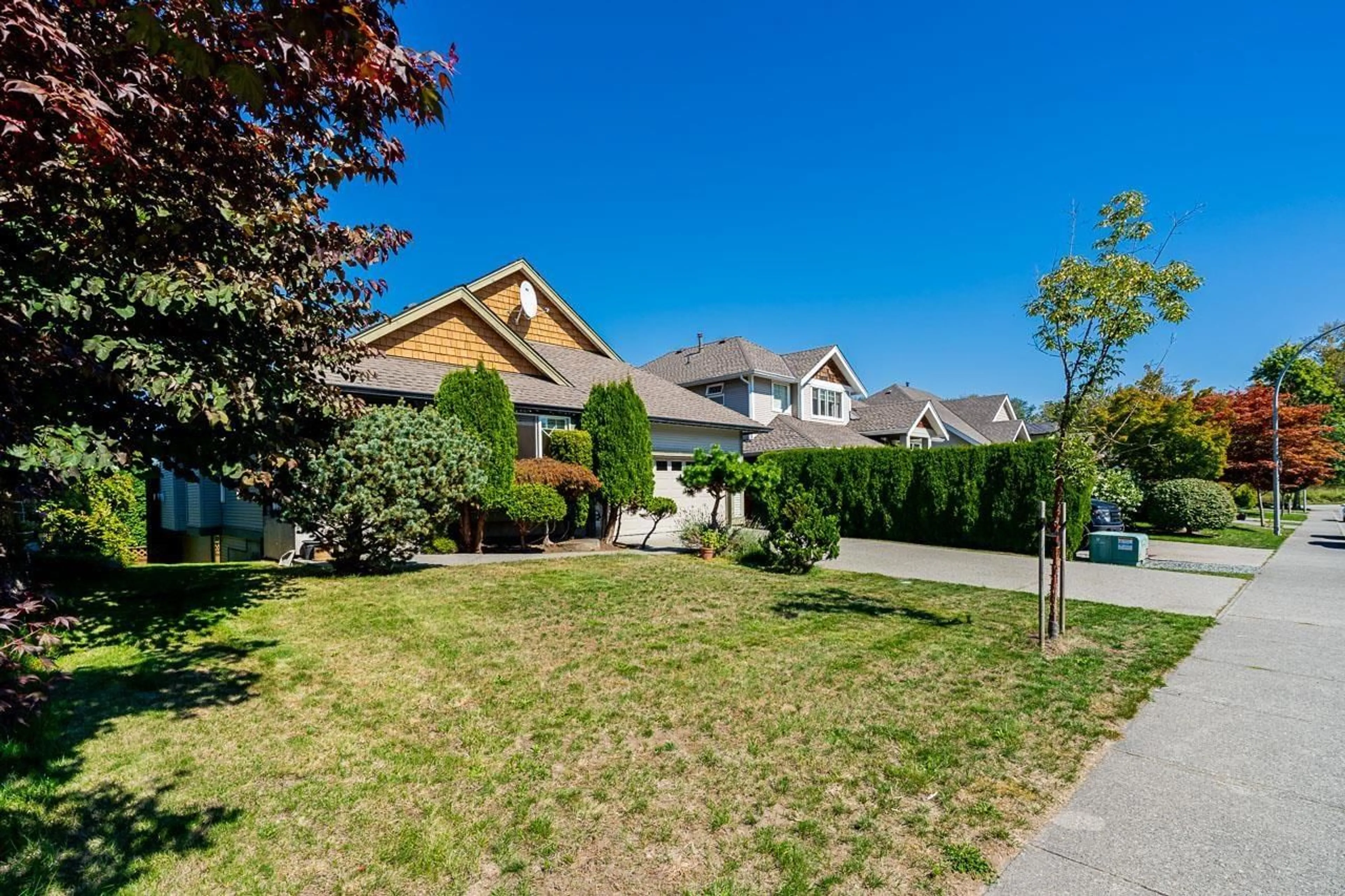 Frontside or backside of a home, the fenced backyard for 22359 50 AVENUE, Langley British Columbia V2Y2V4