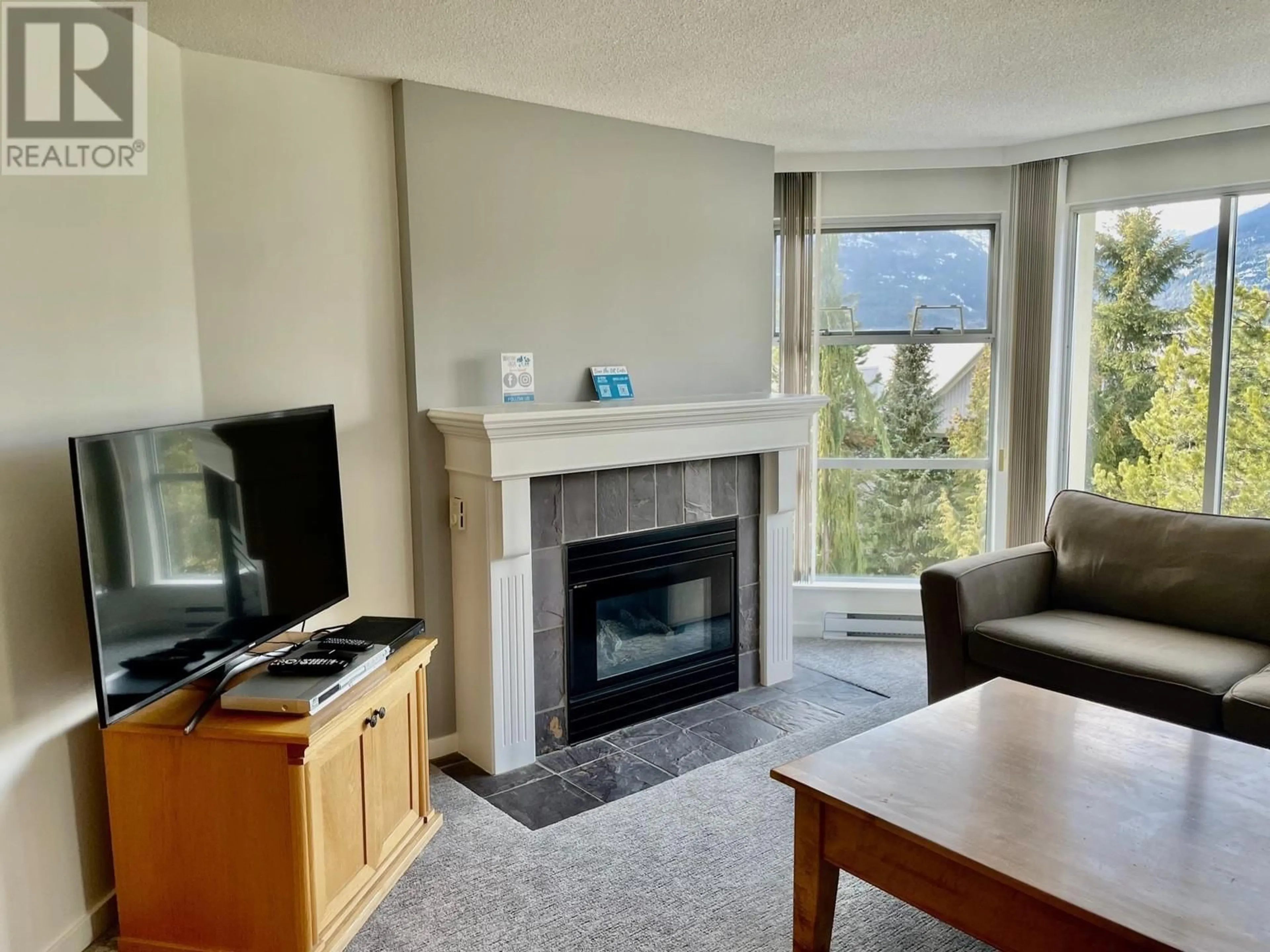 A pic of a room, wood floors for 305 wk3-4910 SPEARHEAD PLACE, Whistler British Columbia V0N1B4