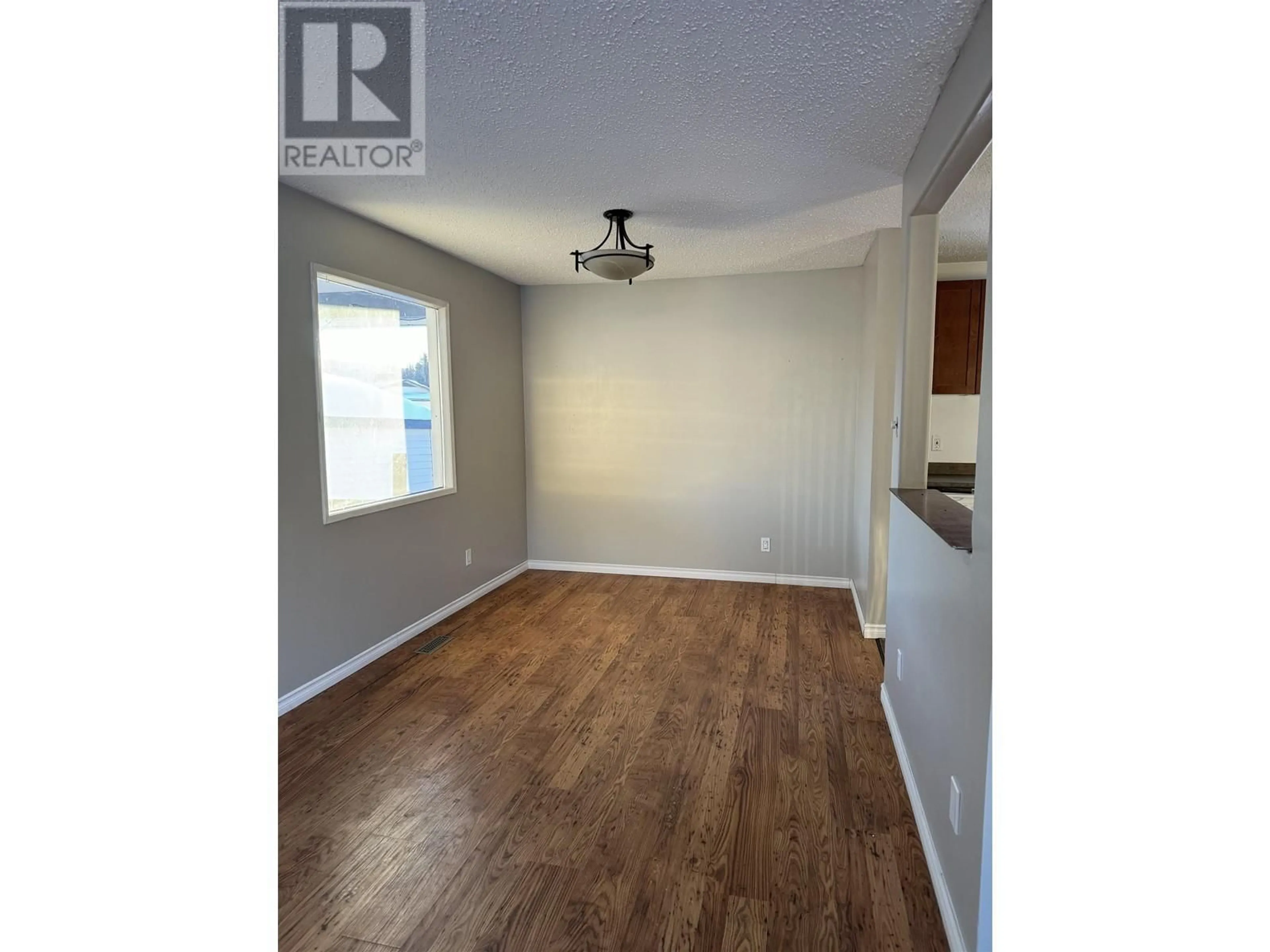 A pic of a room, wood floors for 114 SUMMIT CRESCENT, Mackenzie British Columbia V0J2C0