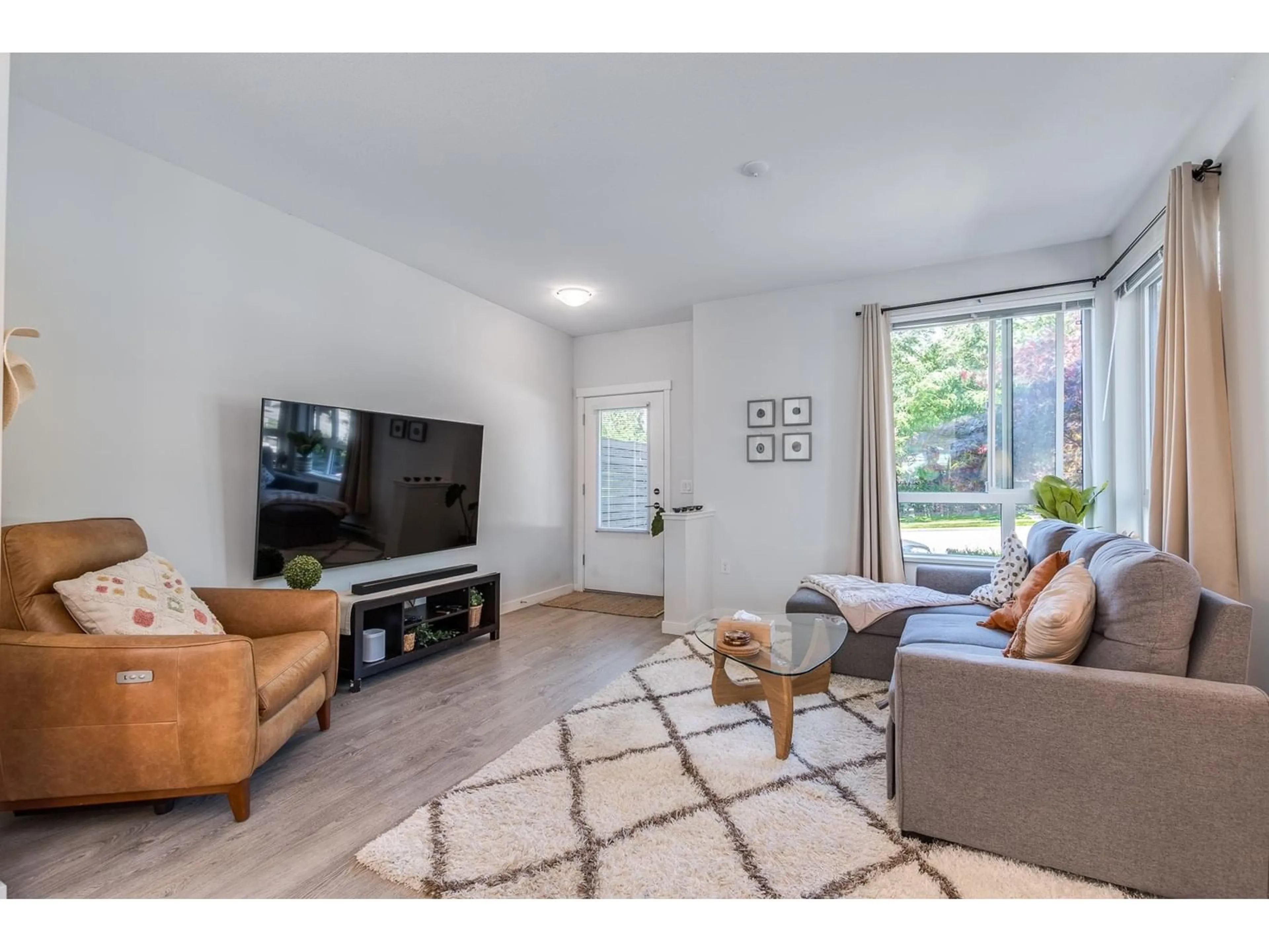 Living room, wood floors for 137 15111 EDMUND DRIVE, Surrey British Columbia V3S0A5