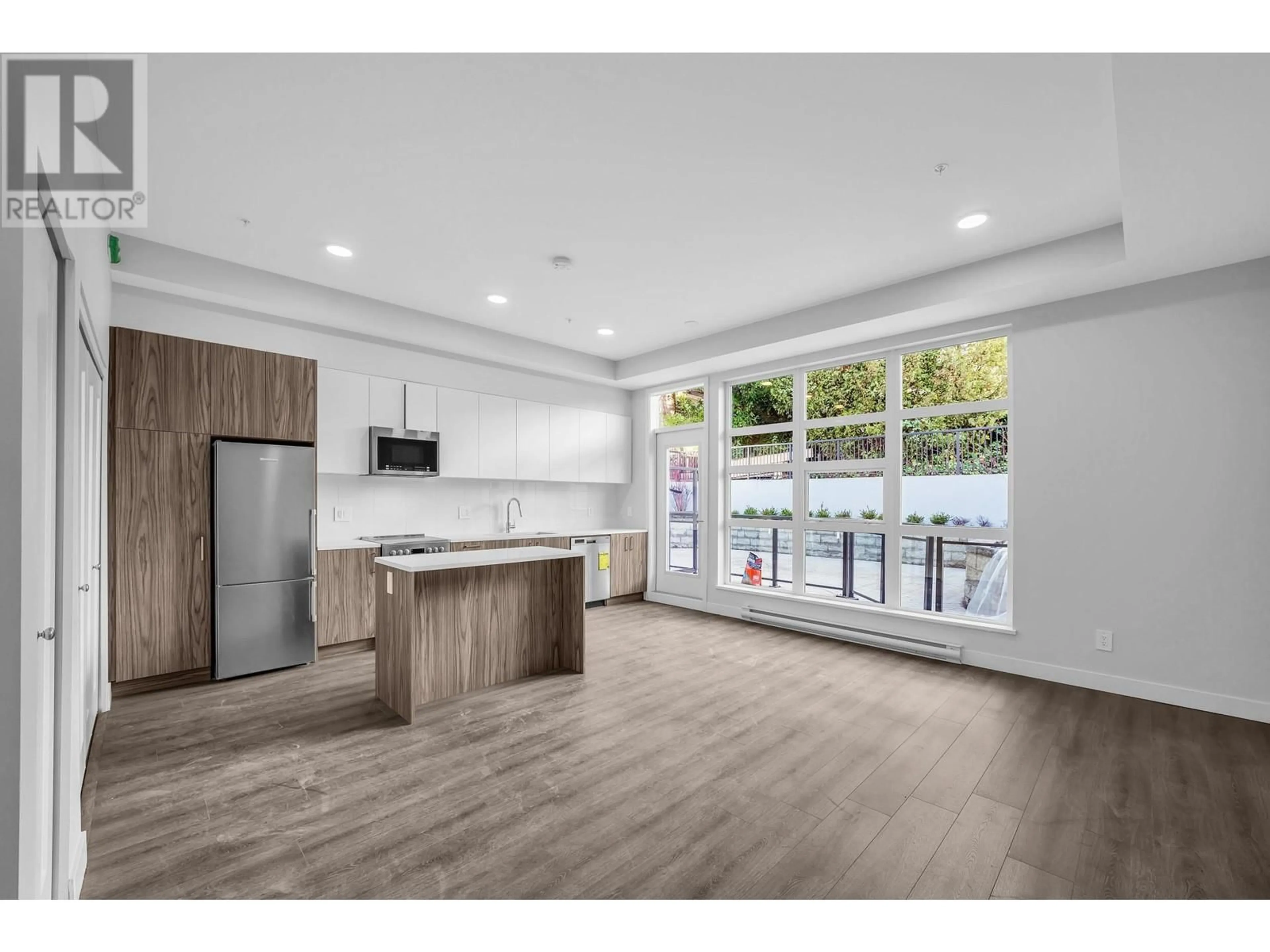 Open concept kitchen for 202 5535 HASTINGS STREET, Burnaby British Columbia V5B1R2