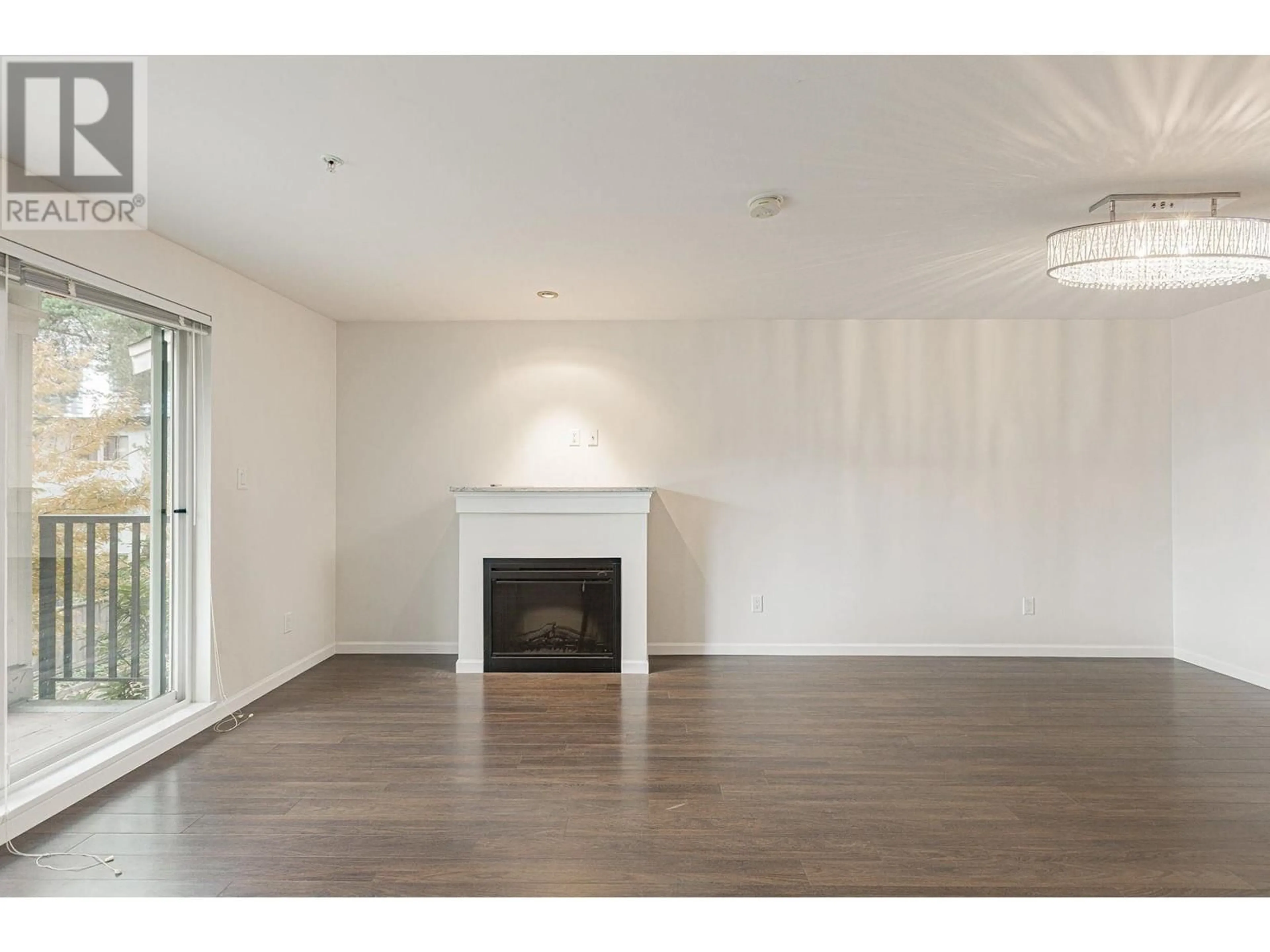 A pic of a room, wood floors for 203 568 ROCHESTER AVENUE, Coquitlam British Columbia V3K0C3