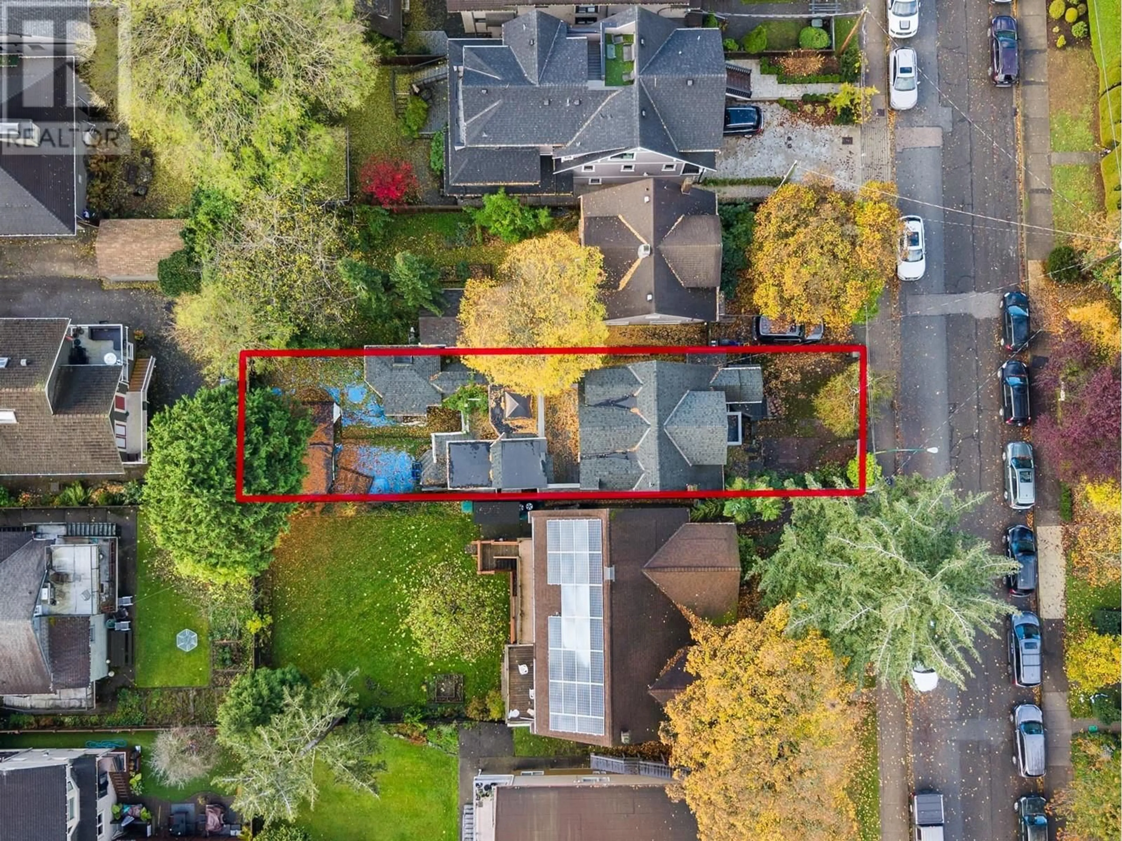 A pic from exterior of the house or condo, the fenced backyard for 2532 W 5TH AVENUE, Vancouver British Columbia V6K1T1