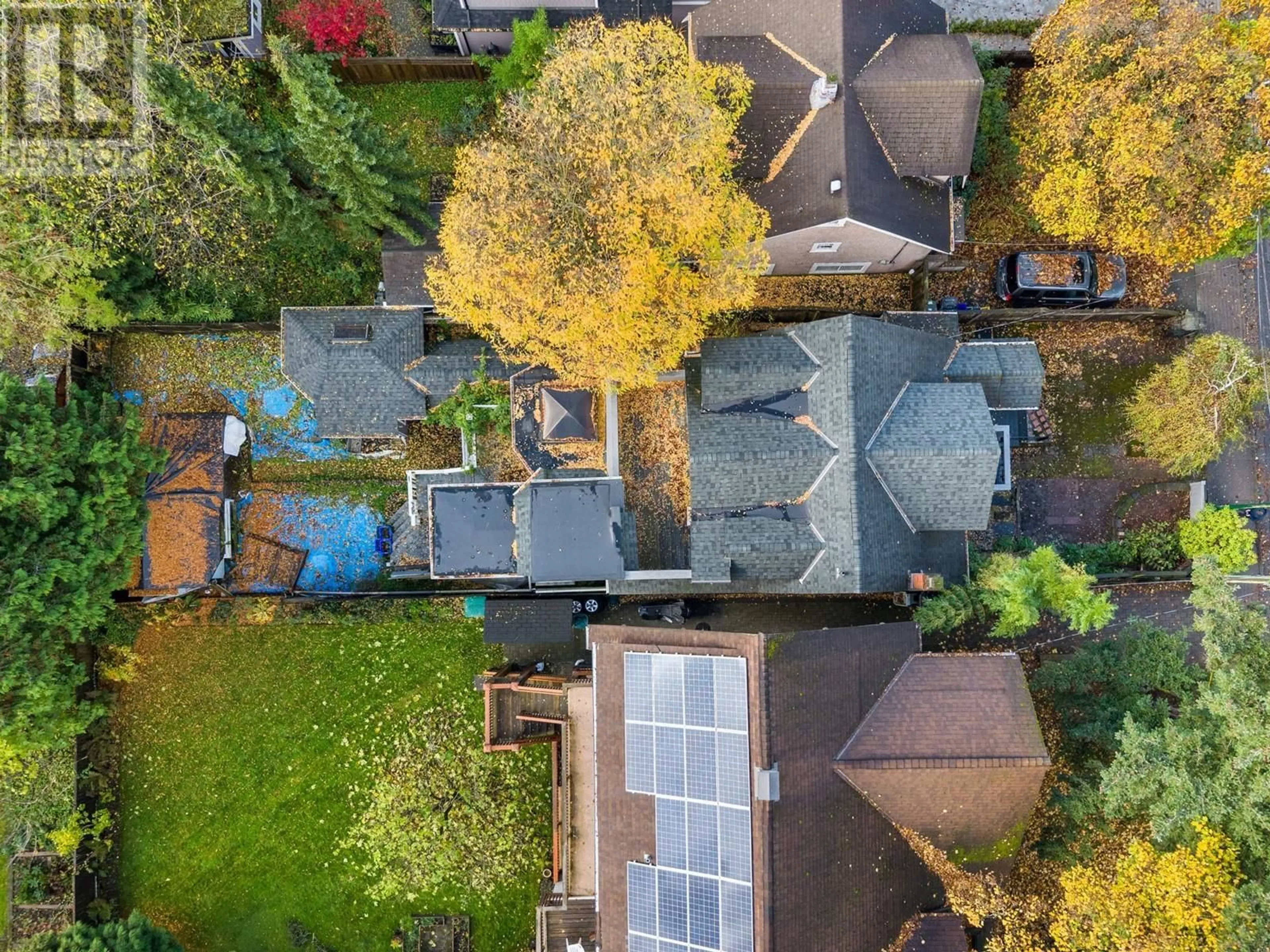 Frontside or backside of a home, the fenced backyard for 2532 W 5TH AVENUE, Vancouver British Columbia V6K1T1