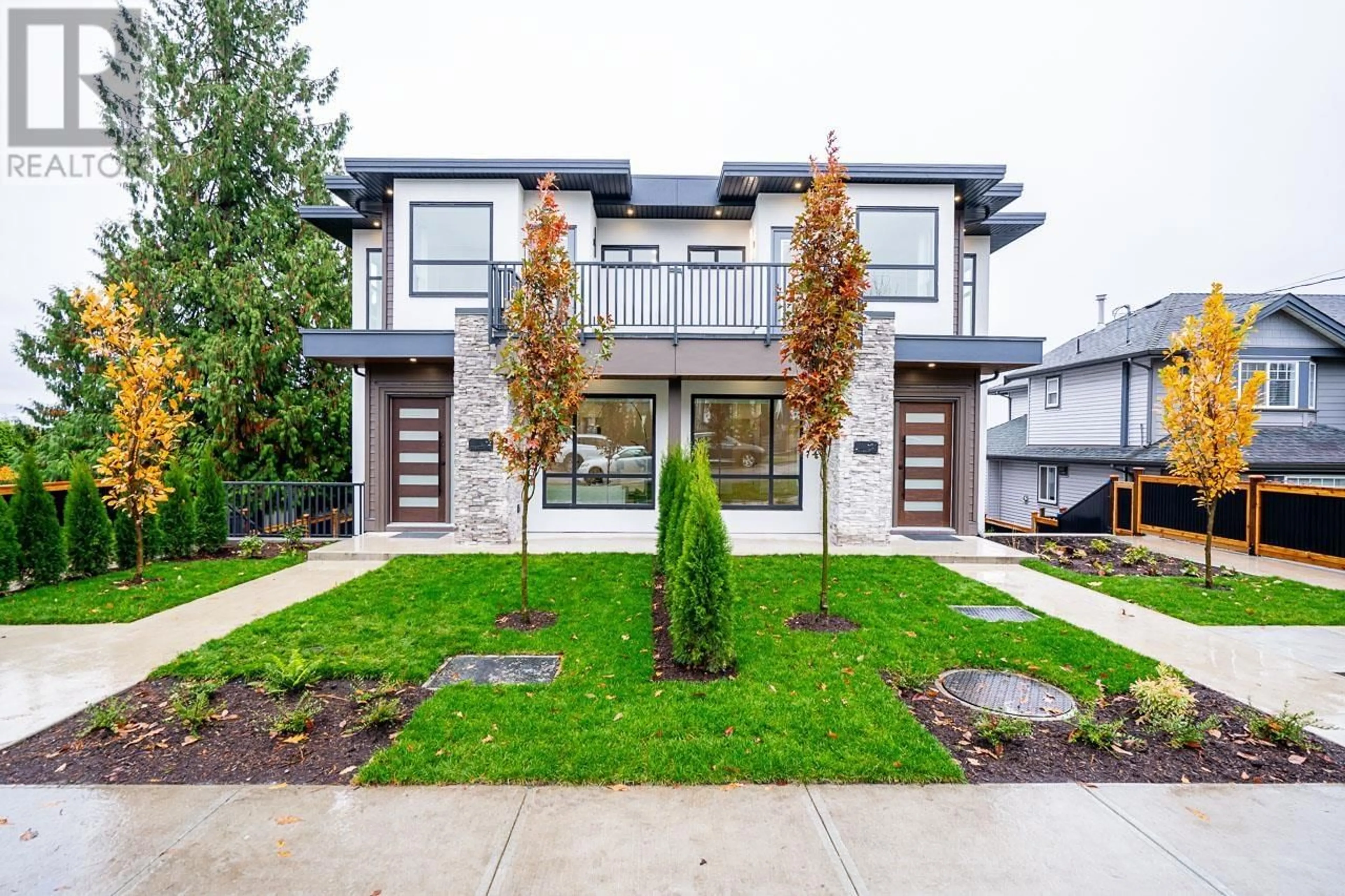 A pic from exterior of the house or condo, the fenced backyard for 102 942 STEWART AVENUE, Coquitlam British Columbia V3K2N6