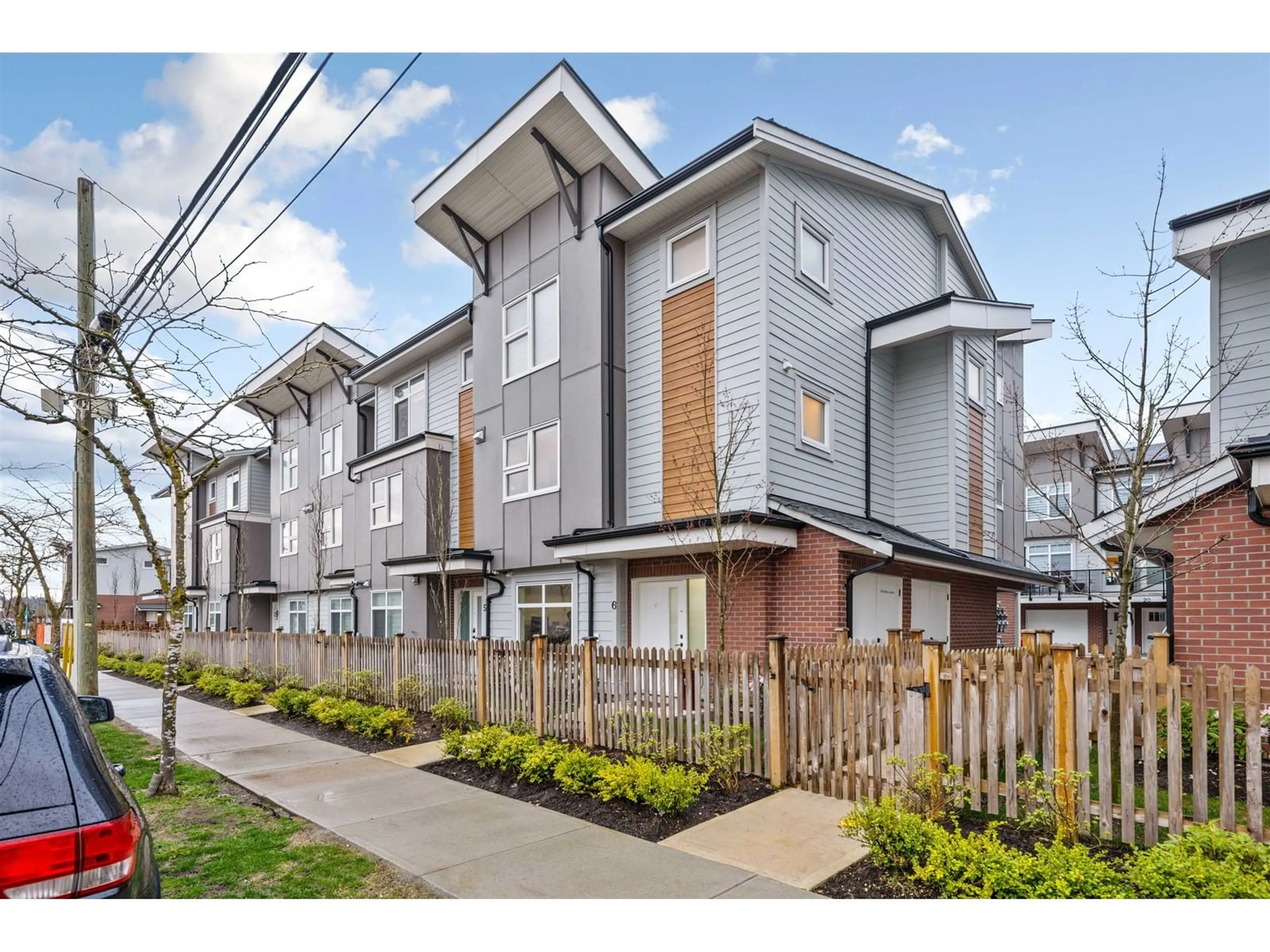 A pic from exterior of the house or condo, the fenced backyard for 6 22334 48 AVENUE, Langley British Columbia V3A3N5