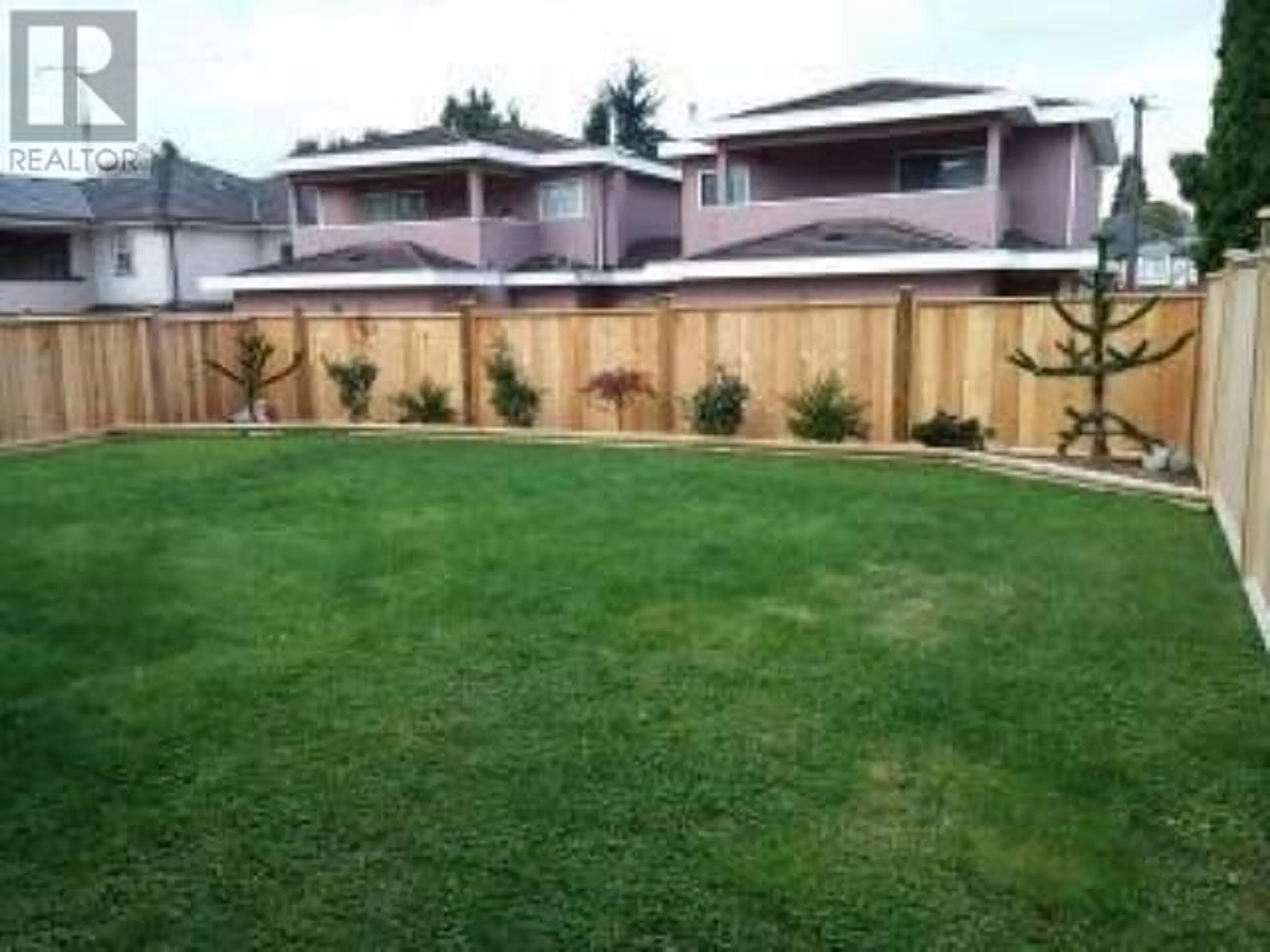 Frontside or backside of a home, the fenced backyard for 5249 CHESHAM AVENUE, Burnaby British Columbia V5H2L1