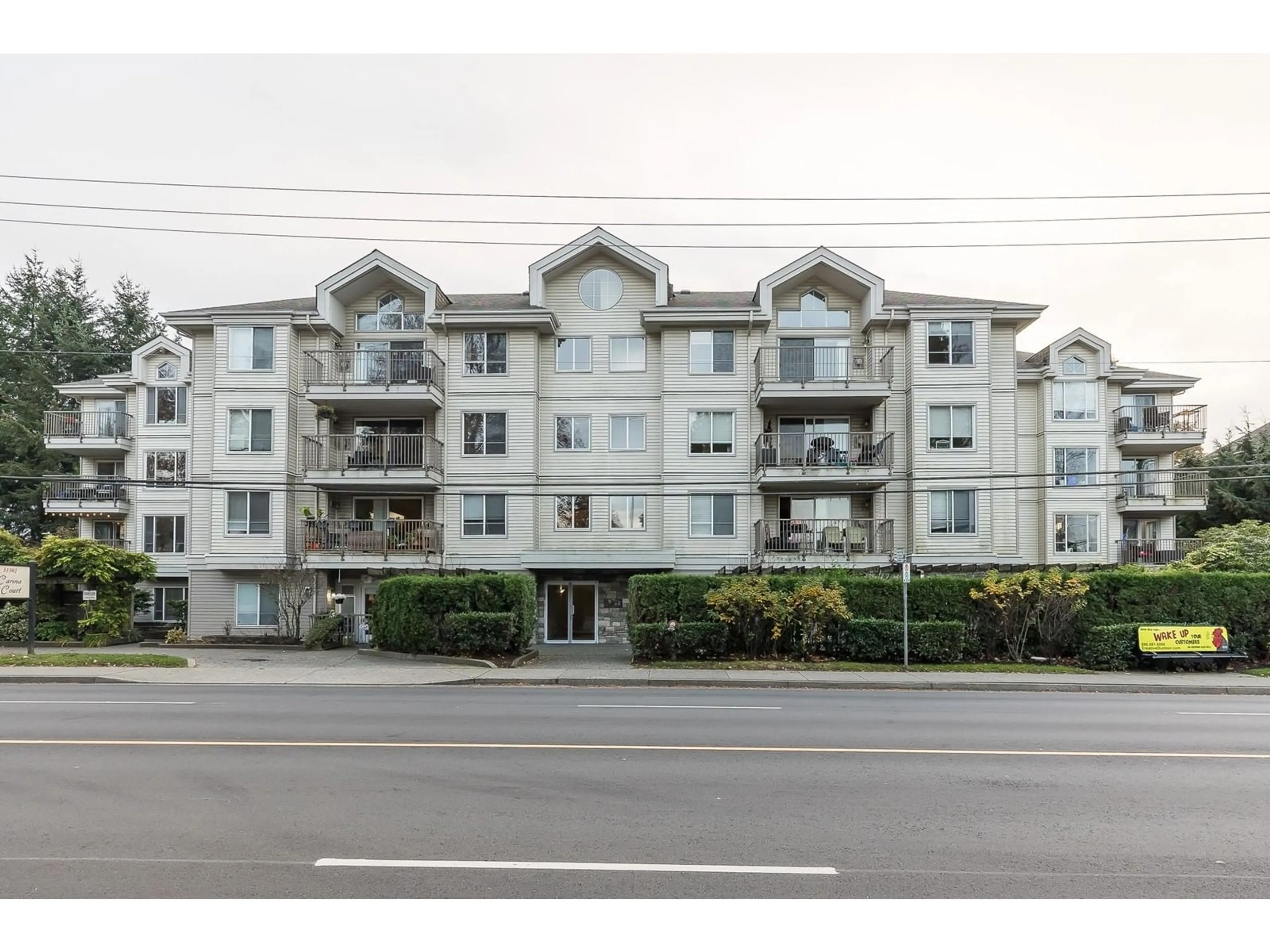 A pic from exterior of the house or condo, the front or back of building for 206 33502 GEORGE FERGUSON WAY, Abbotsford British Columbia V2S8G3