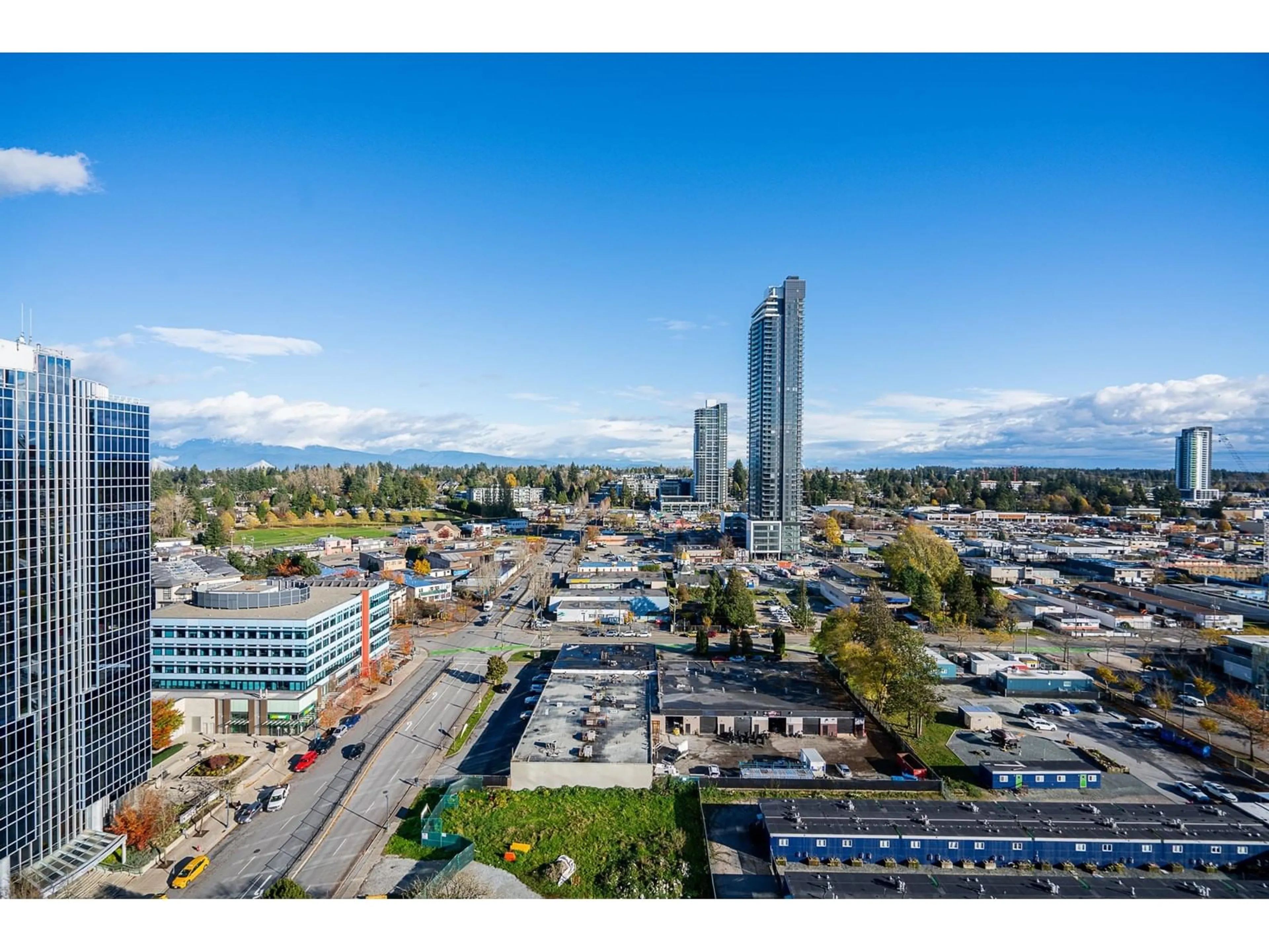 A pic from exterior of the house or condo, the view of city buildings for 2112 10777 UNIVERSITY DRIVE, Surrey British Columbia V3T0E7