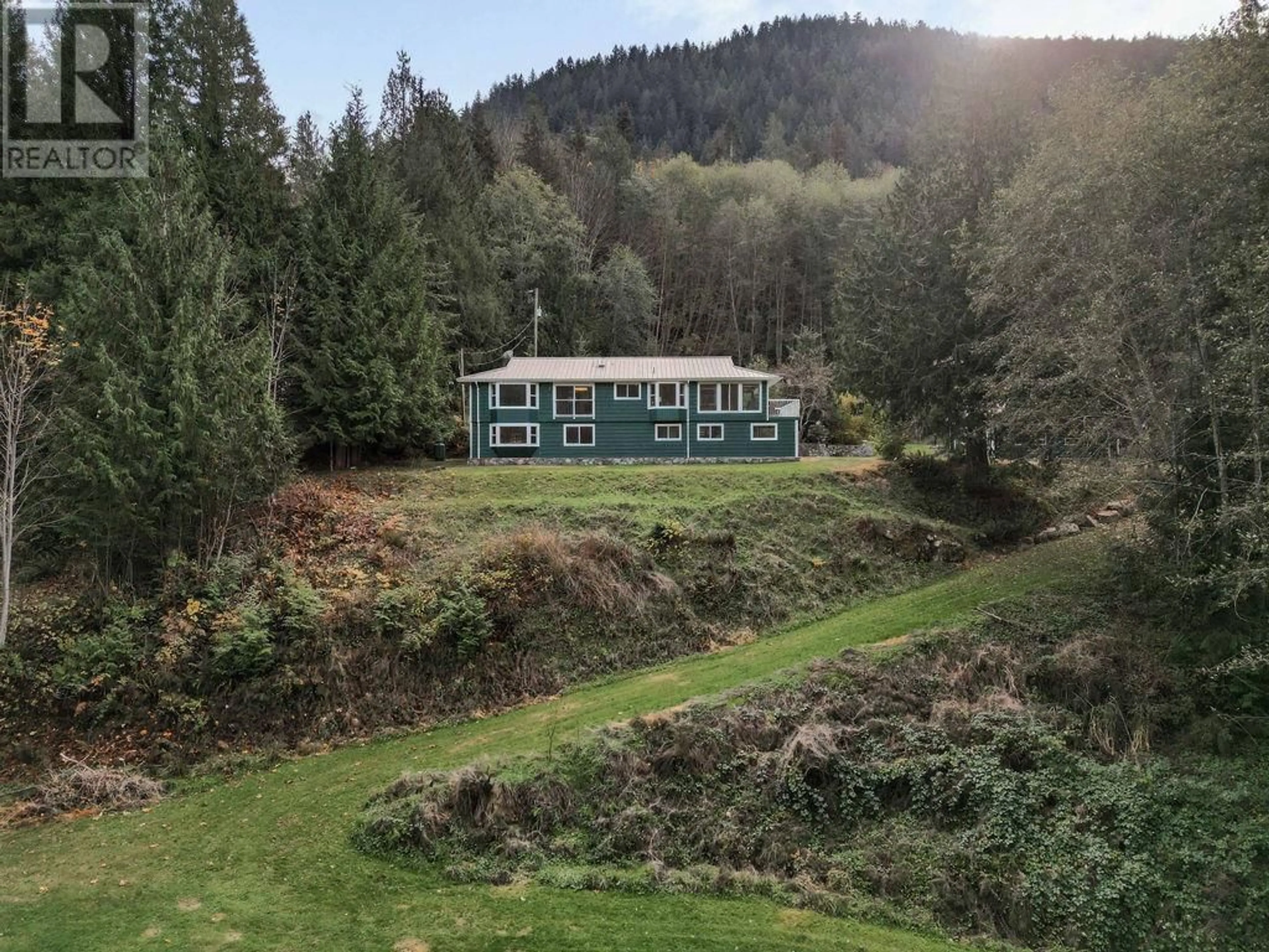 Frontside or backside of a home, the front or back of building for 12815 SUNSHINE COAST HIGHWAY, Madeira Park British Columbia V0N2H1