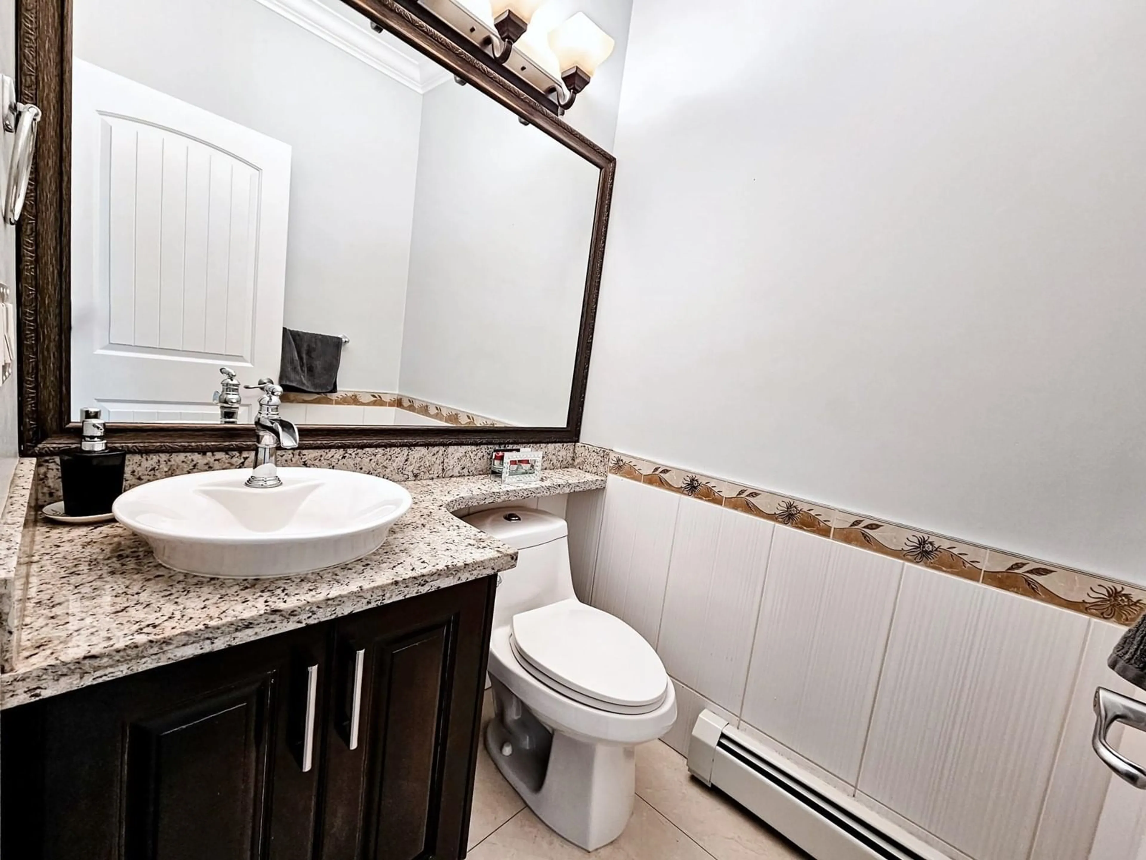 Standard bathroom, wood floors for 16785 58B AVENUE, Surrey British Columbia V3S2K3