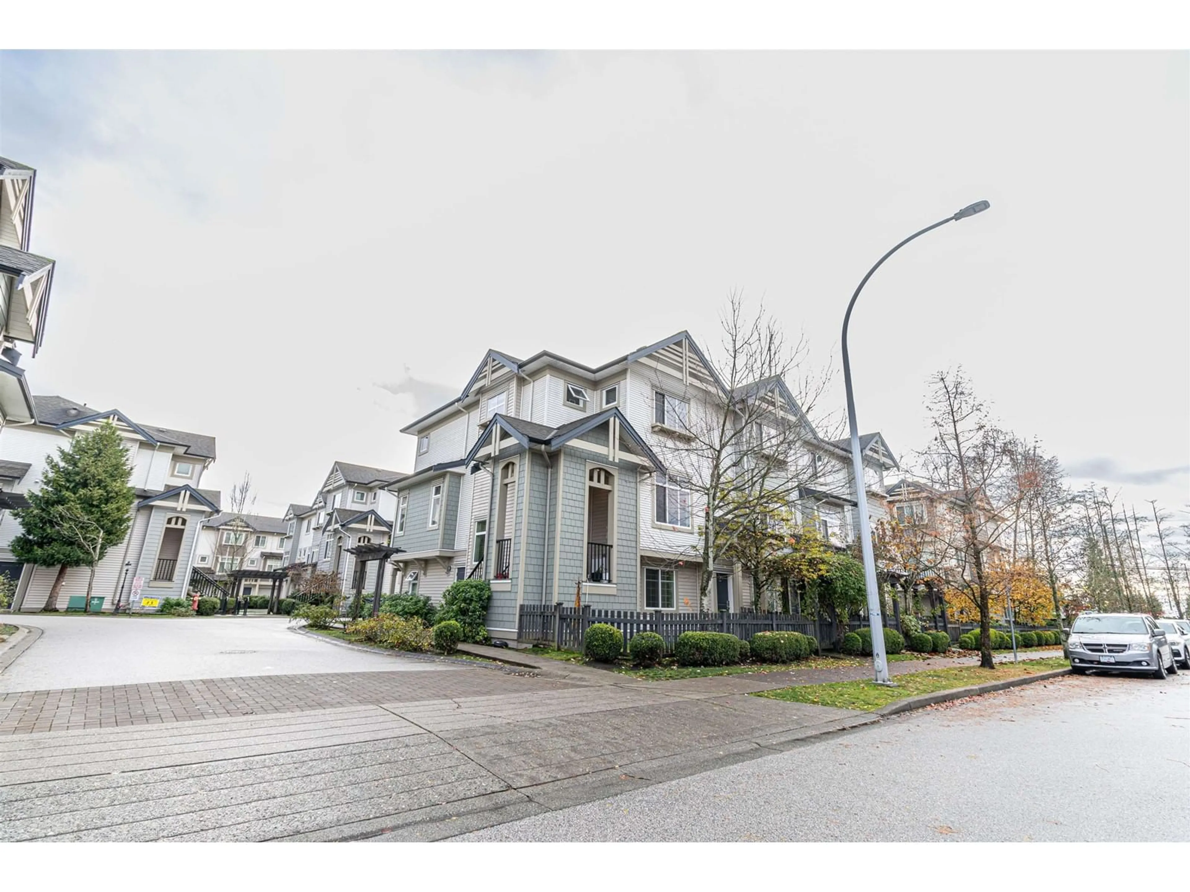 A pic from exterior of the house or condo, the street view for 1 8418 163 STREET, Surrey British Columbia V4N6K8