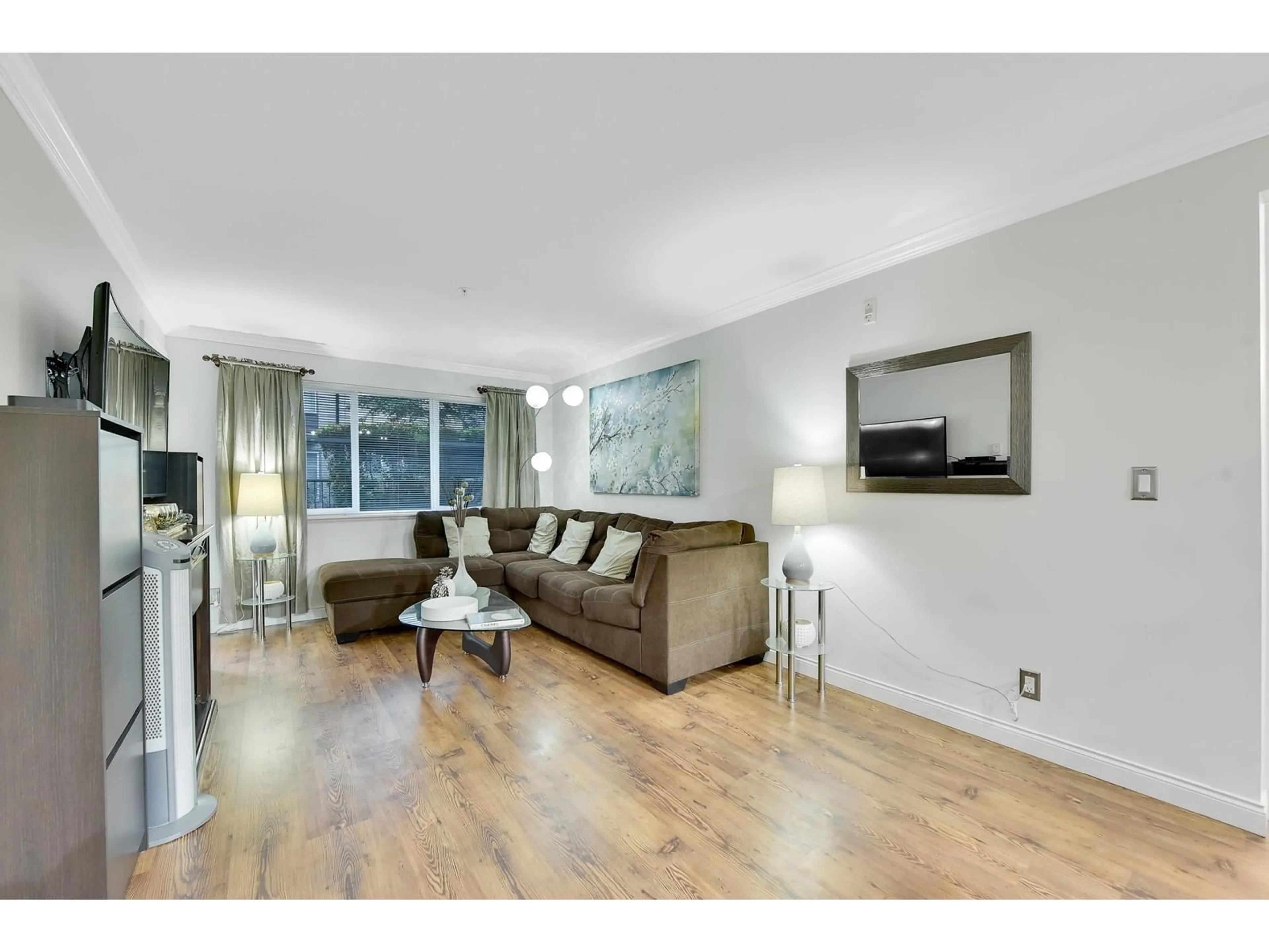 A pic of a room, wood floors for 101 5438 198 STREET STREET, Langley British Columbia V3A1G2