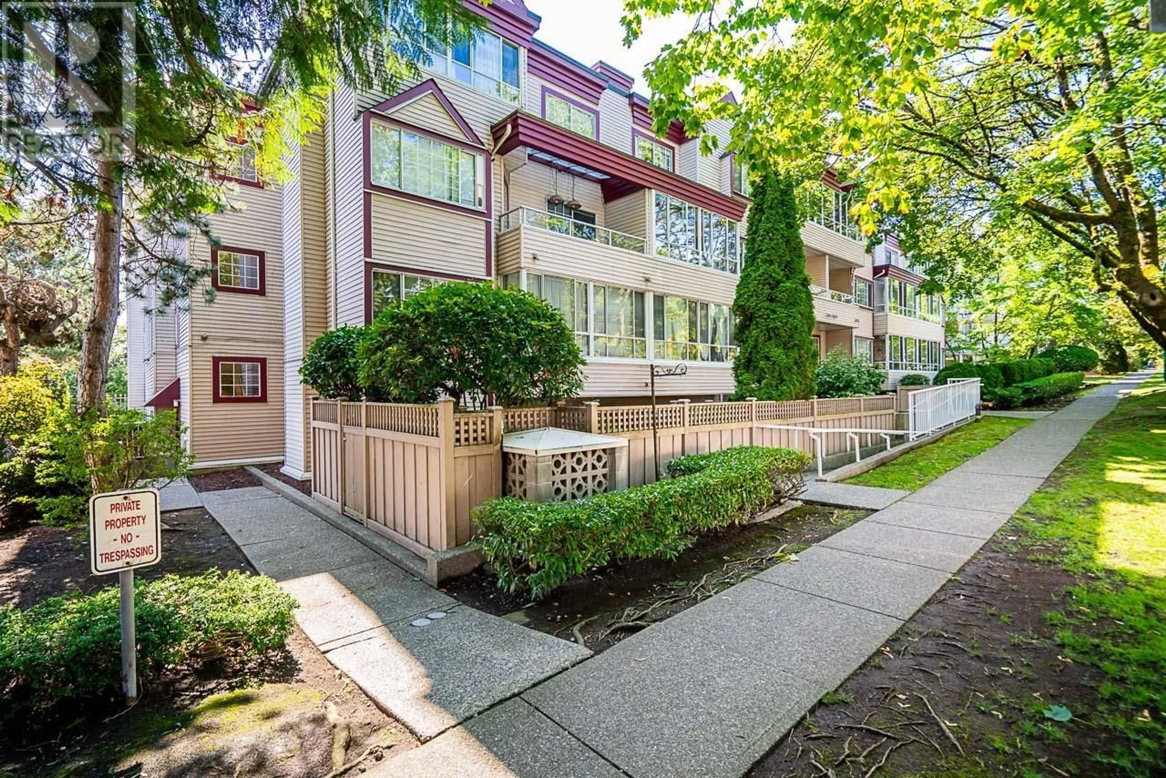 A pic from exterior of the house or condo, the fenced backyard for 102 1386 WEST 73RD AVENUE, Vancouver British Columbia V6P3E8