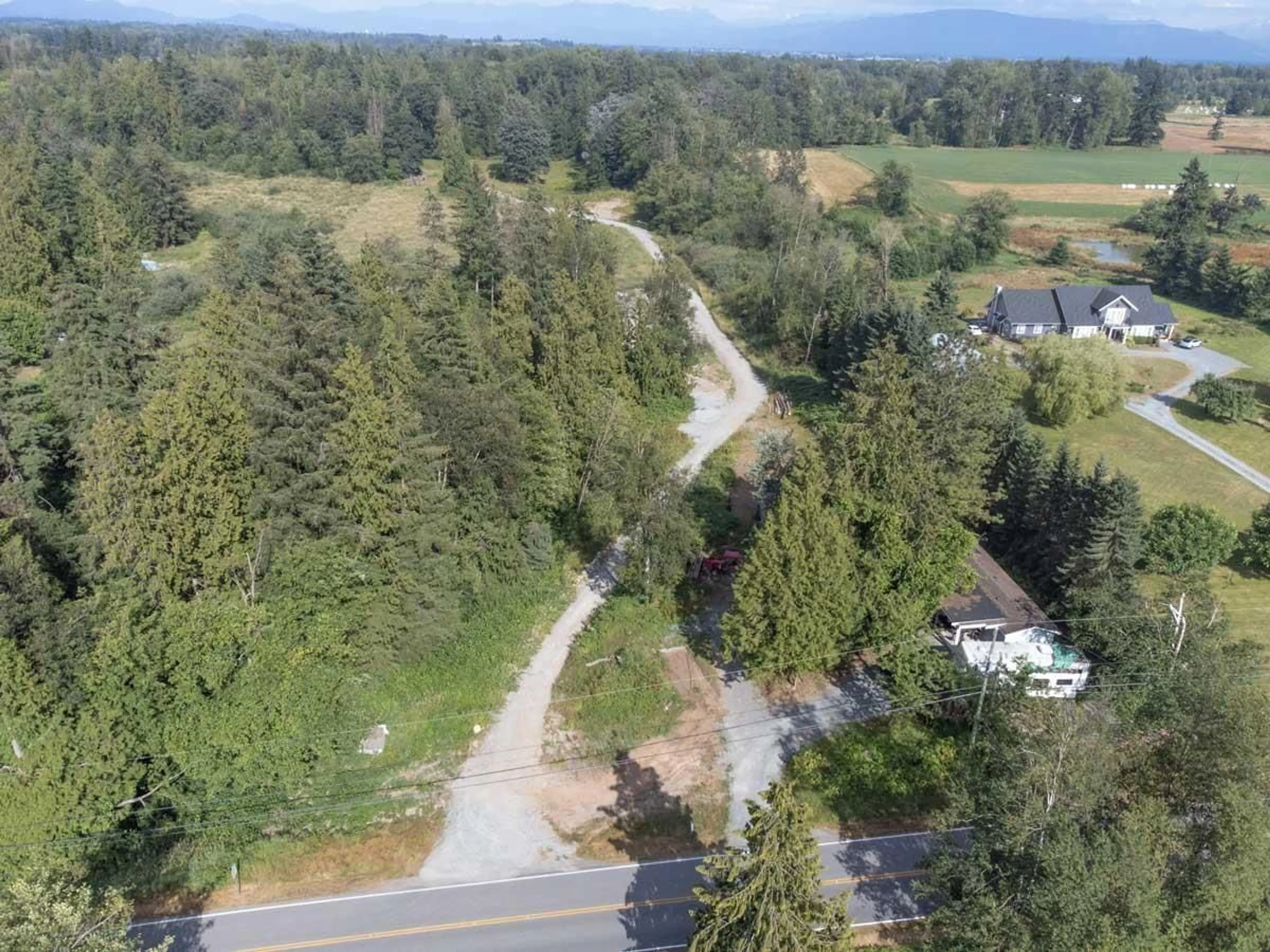 A pic from exterior of the house or condo, the street view for 488 240 STREET, Langley British Columbia V2Z2X6