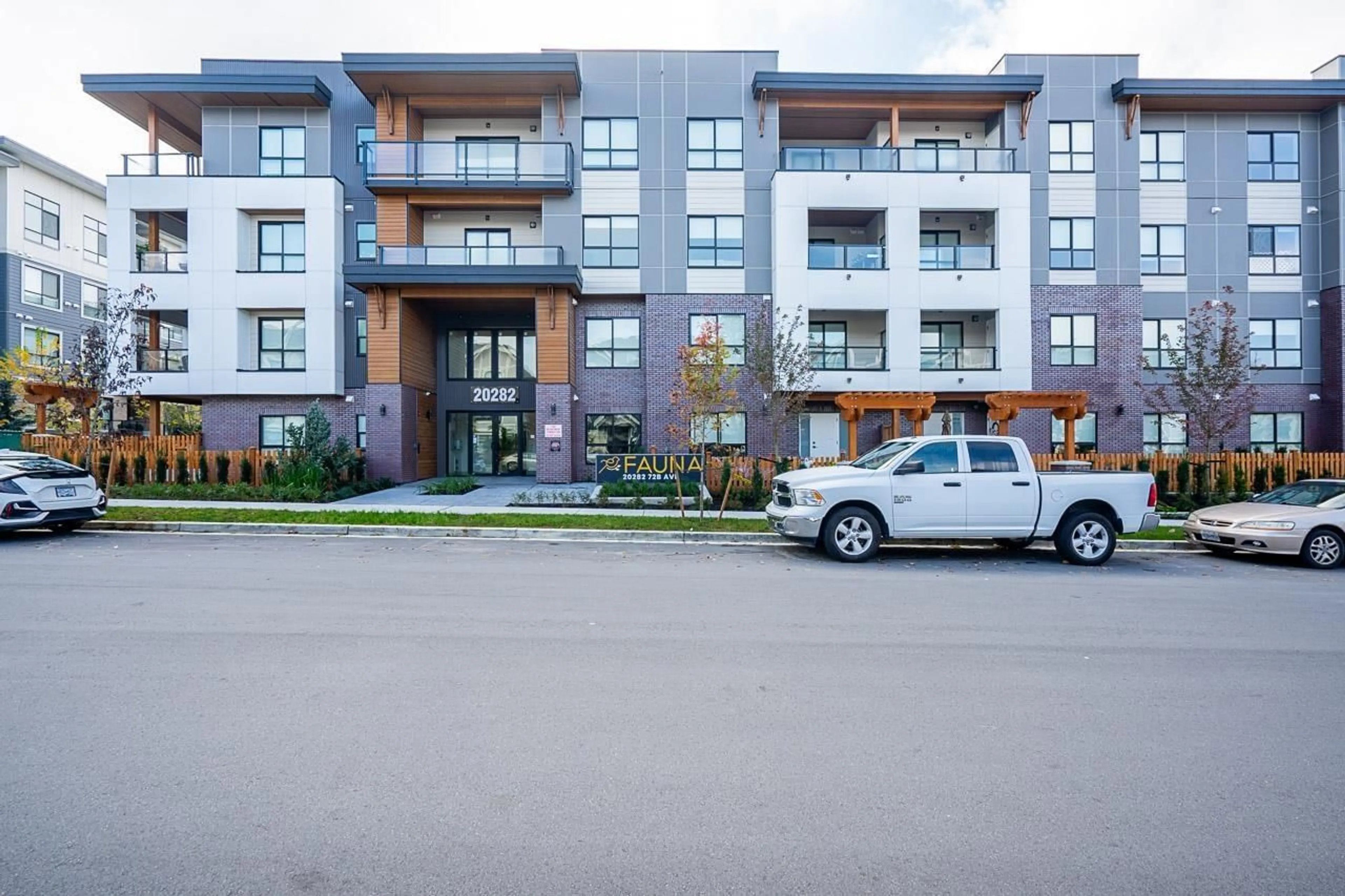 A pic from exterior of the house or condo, the front or back of building for 417 20282 72B AVENUE, Surrey British Columbia V2Y3X3