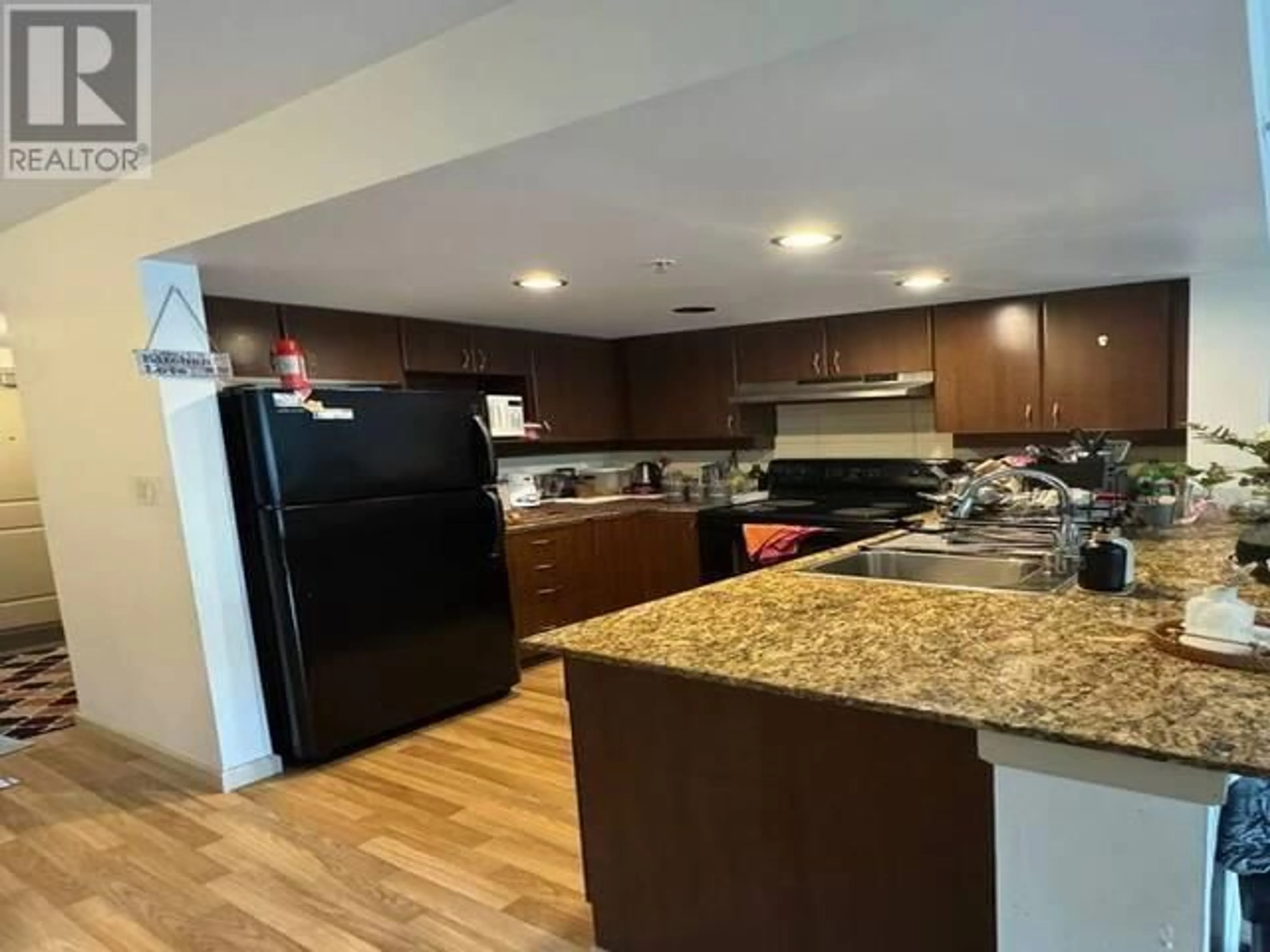 Open concept kitchen for 506 9262 UNIVERSITY CRESCENT, Burnaby British Columbia V5A0A4