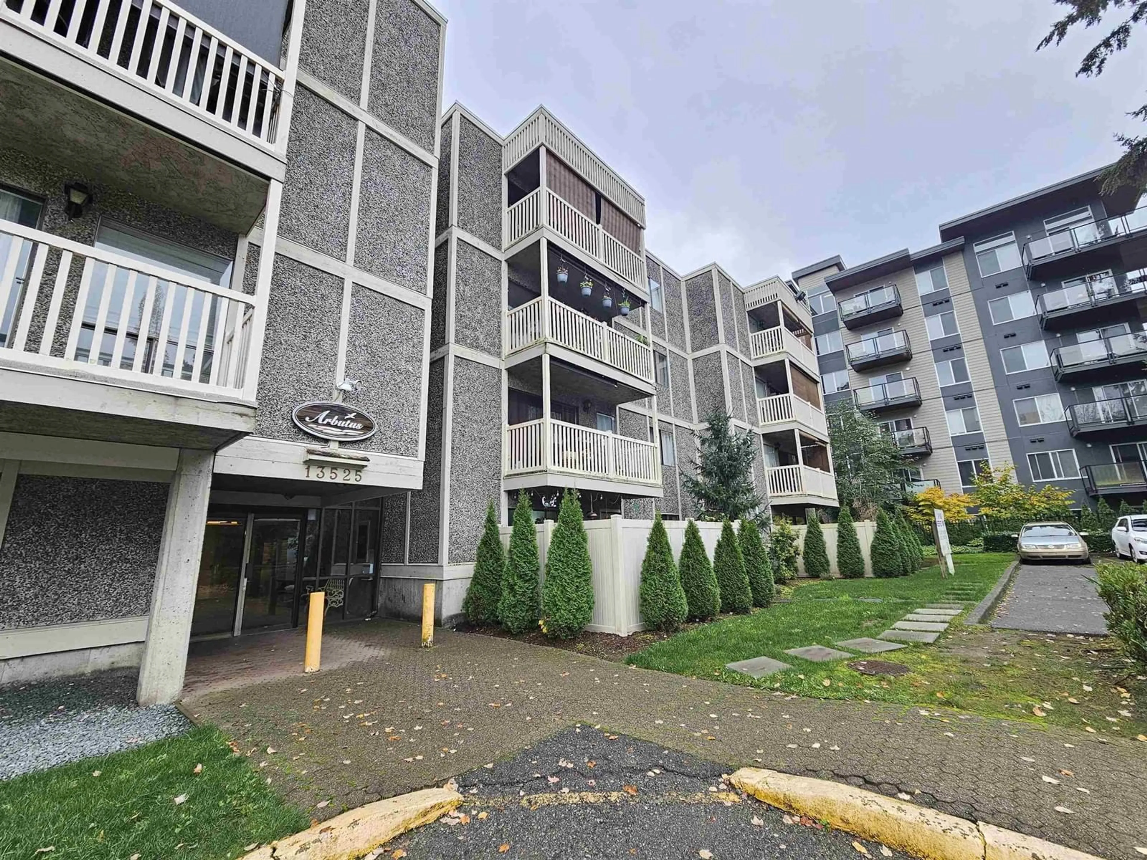 A pic from exterior of the house or condo, the street view for 308 13525 96 AVENUE, Surrey British Columbia V3V1Y8