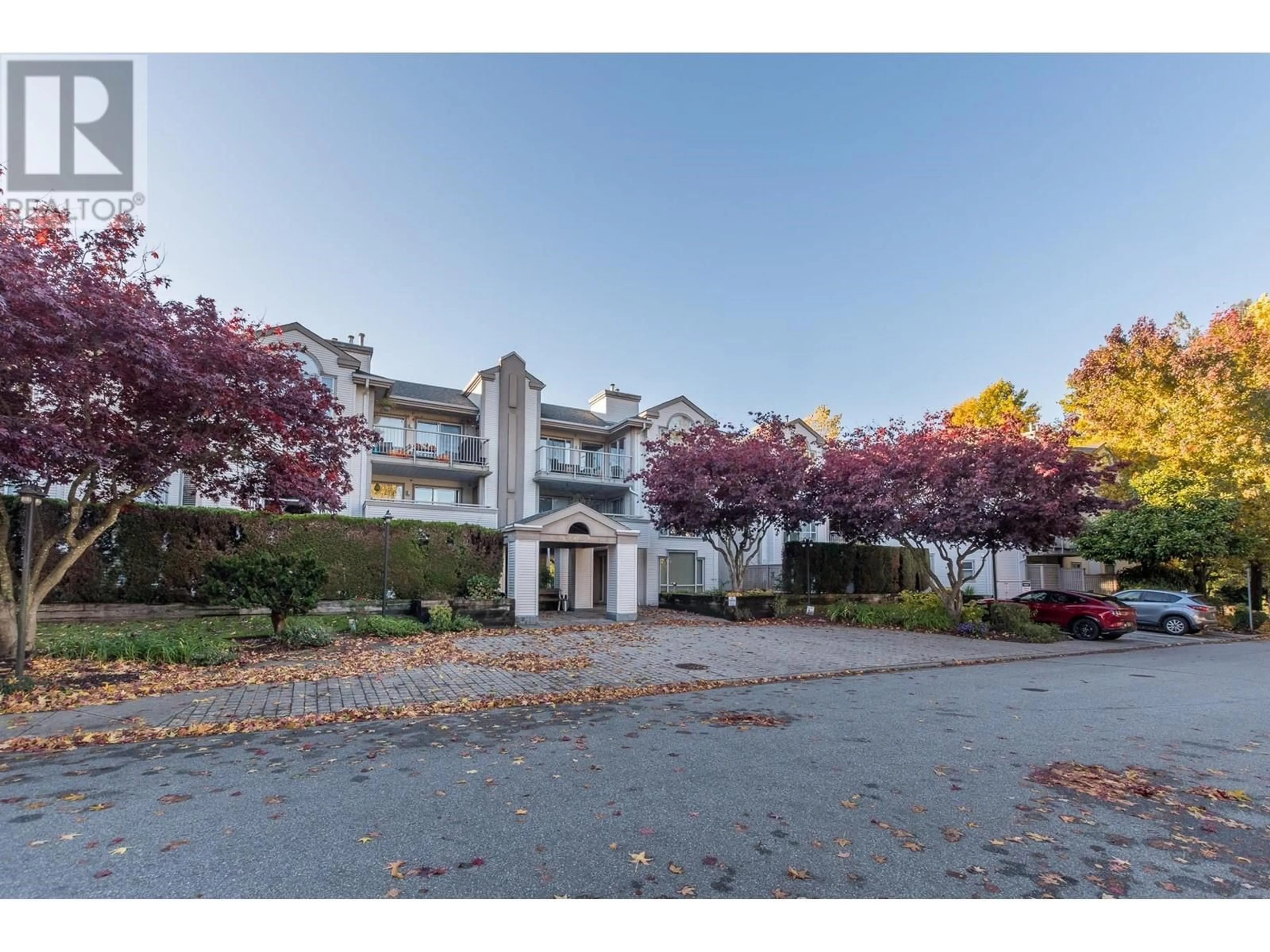 A pic from exterior of the house or condo, the front or back of building for 107 19122 122 AVENUE, Pitt Meadows British Columbia V3Y2N7