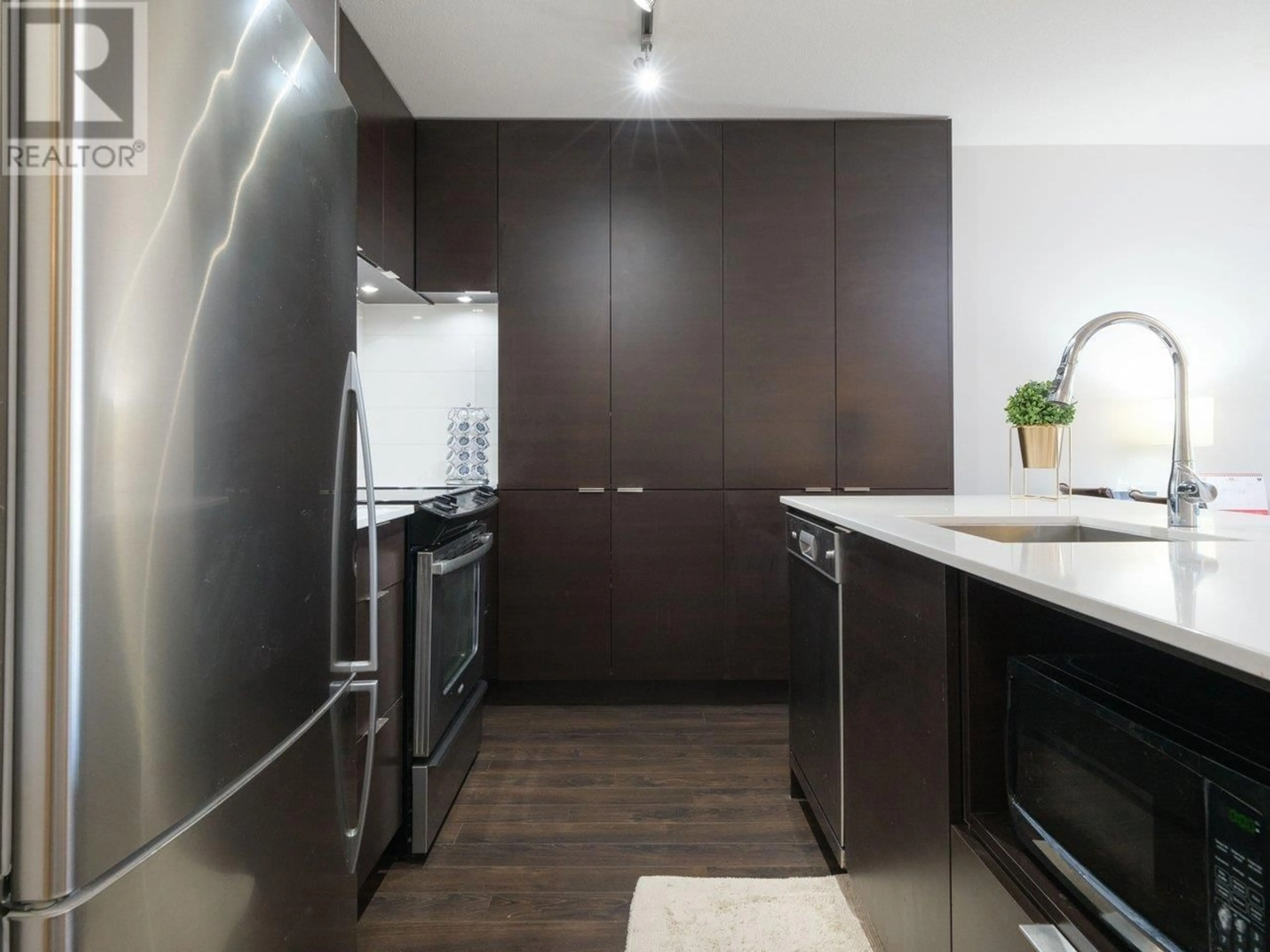 Contemporary kitchen, wood floors for 307 1677 LLOYD AVENUE, North Vancouver British Columbia V7P0B1