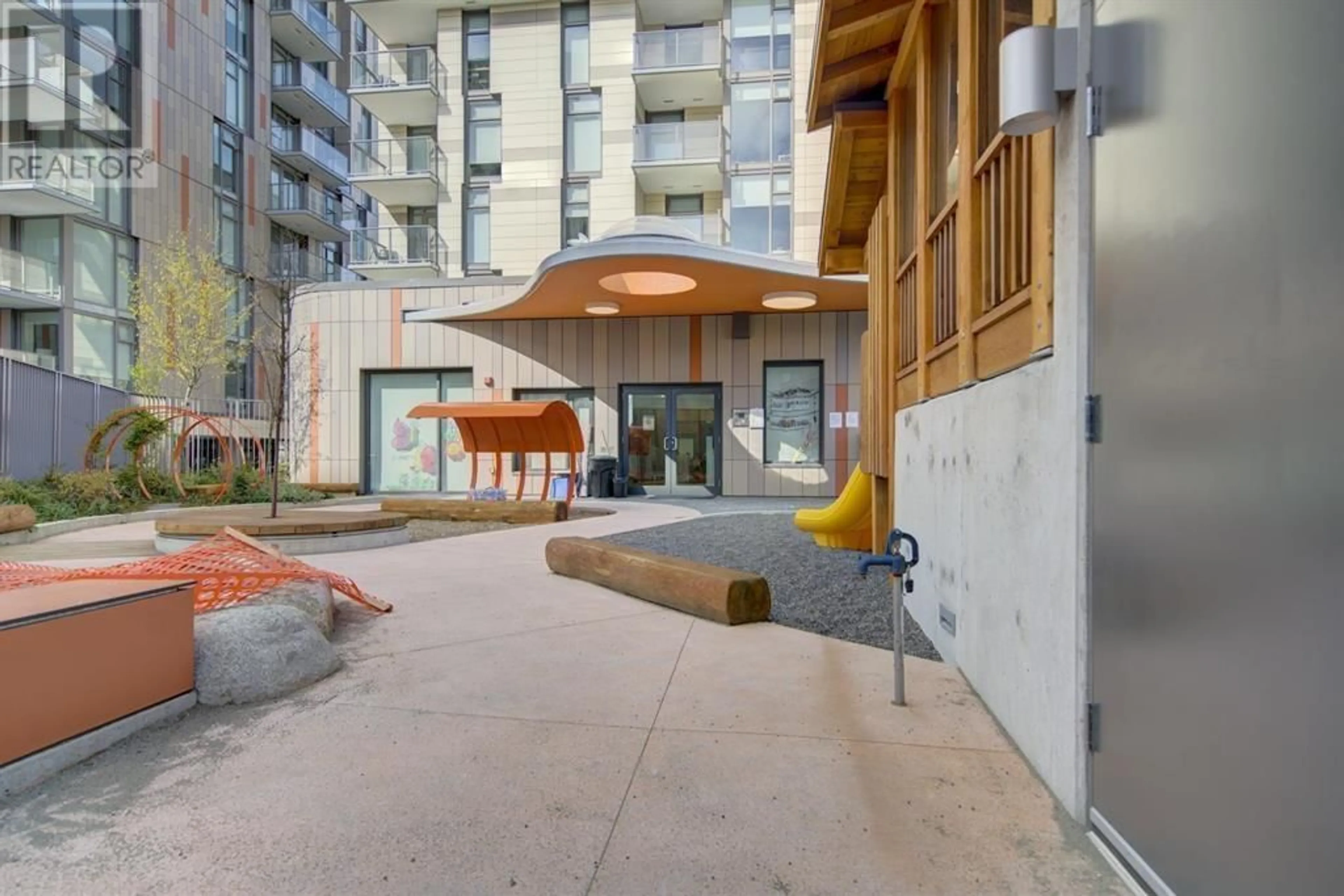 A pic from exterior of the house or condo, the front or back of building for 210 8138 FRASER STREET, Vancouver British Columbia V5X0J8