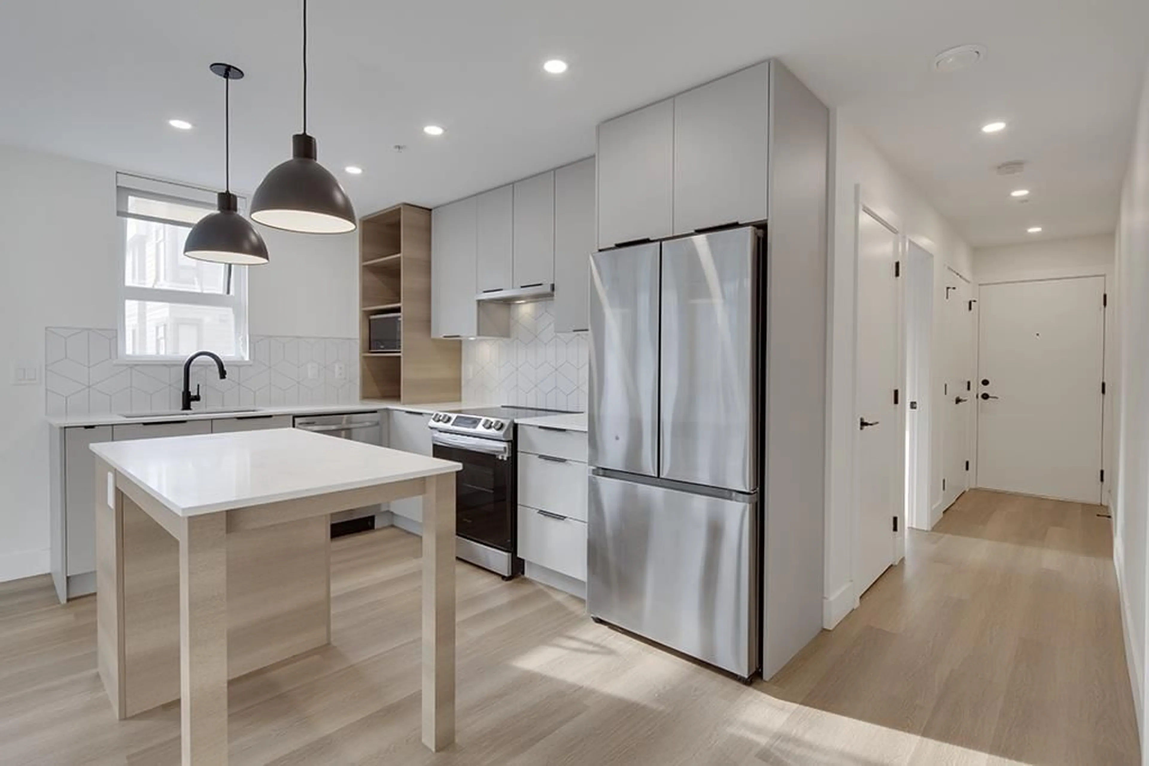 Contemporary kitchen, wood floors for 513 10778 138 STREET, Surrey British Columbia V3T0S5