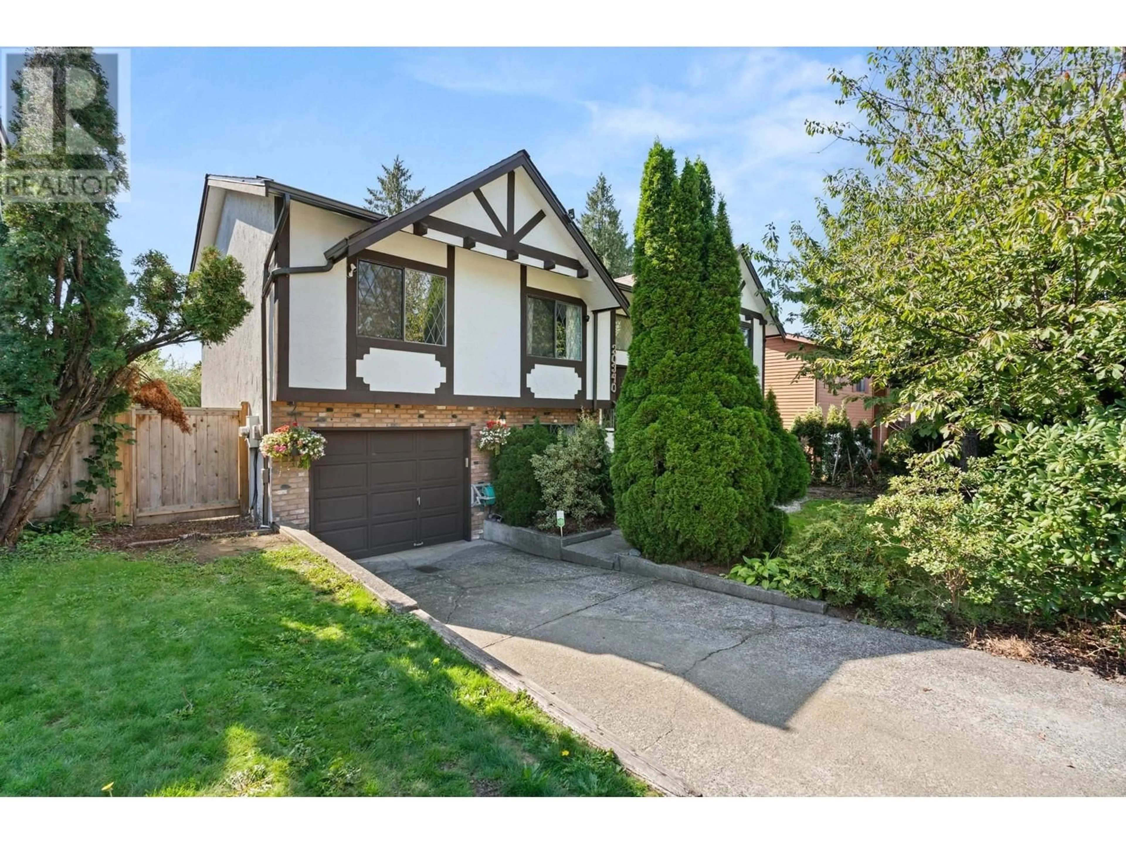 Frontside or backside of a home, the fenced backyard for 20340 THORNE AVENUE, Maple Ridge British Columbia V2X8T9