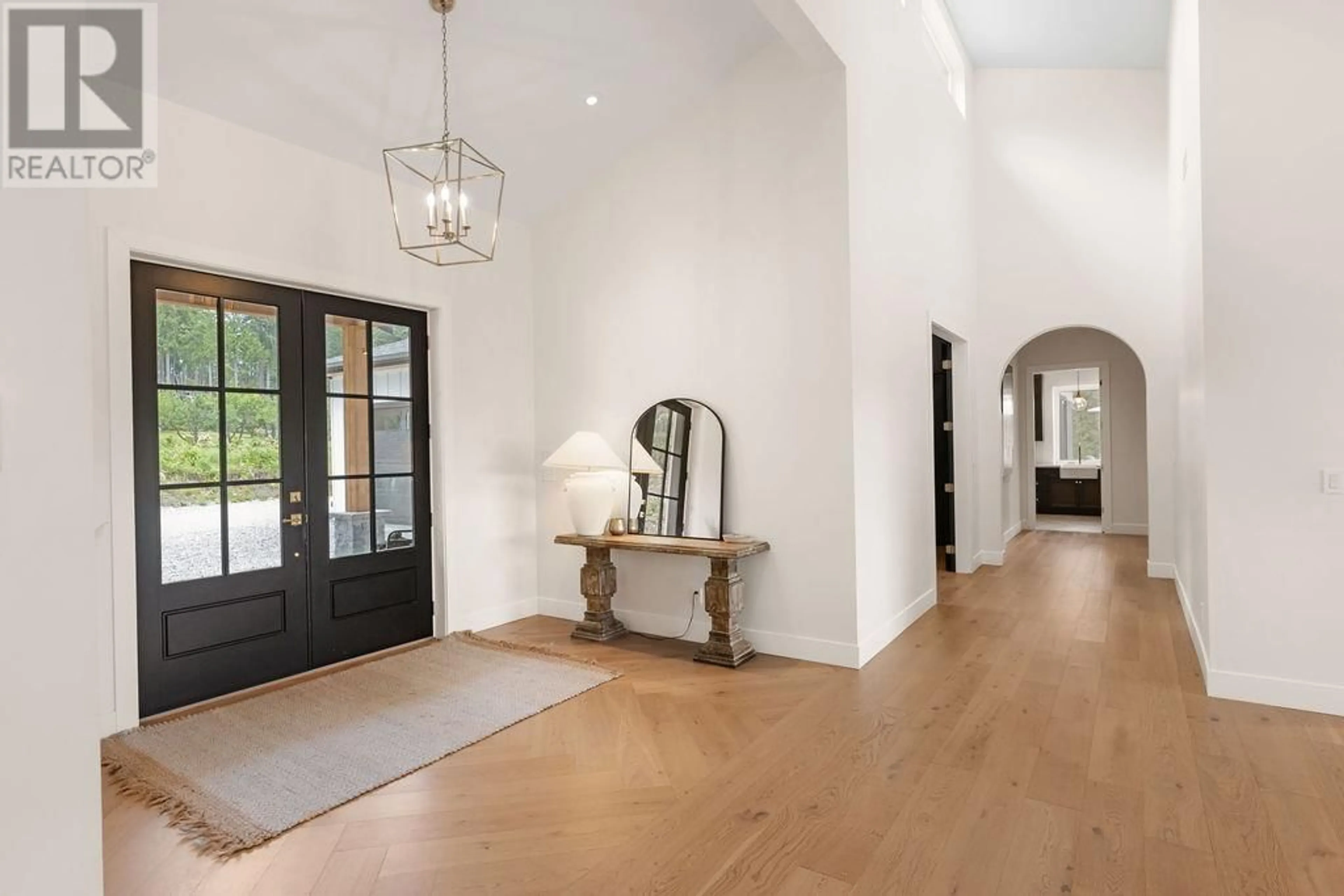 Indoor entryway, wood floors for 6724 ACORN ROAD, Sechelt British Columbia V7Z0N3