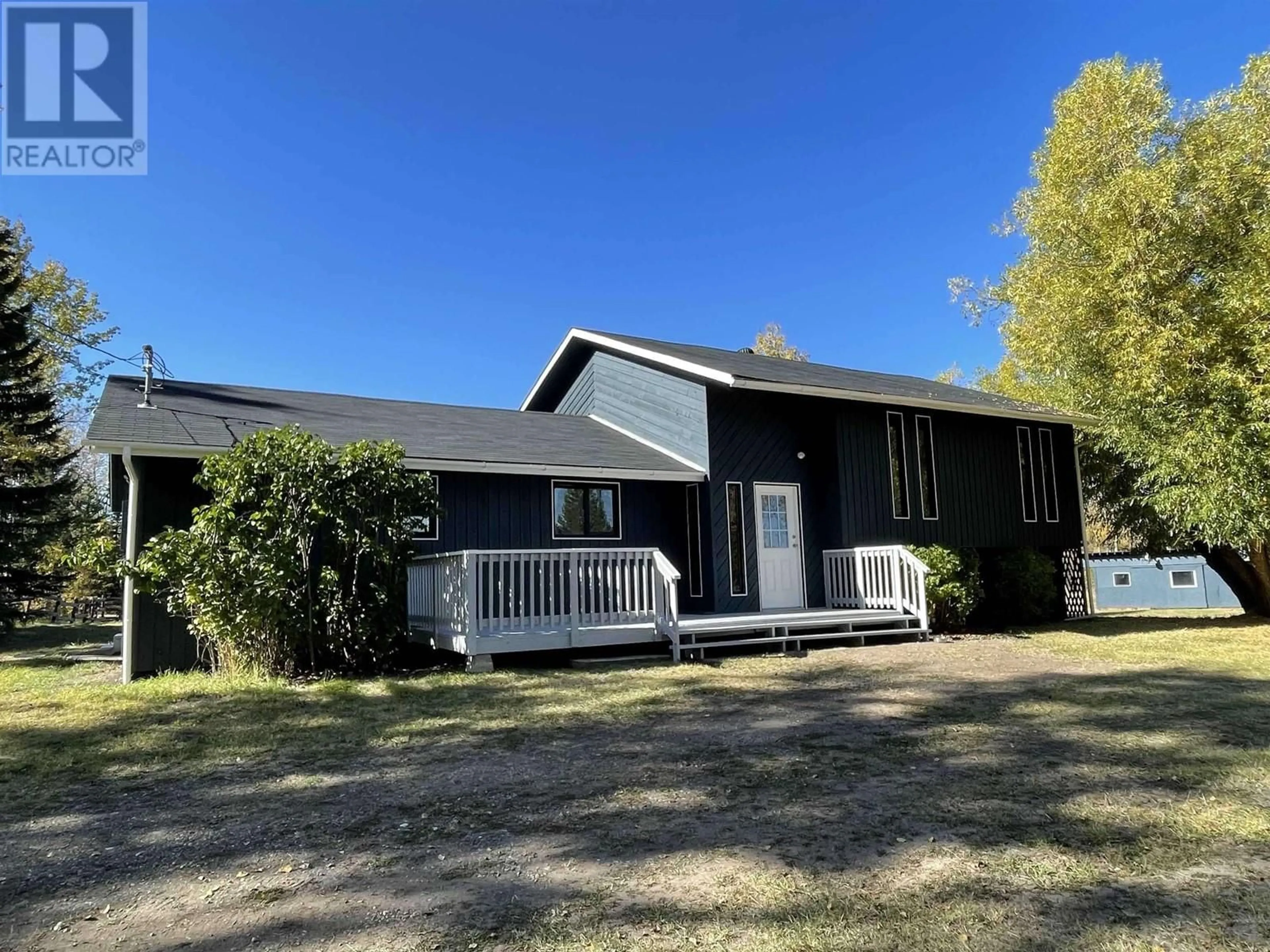 Frontside or backside of a home, the front or back of building for 5492 UPPER HOUSEMAN ROAD, 100 Mile House British Columbia V0K2E1