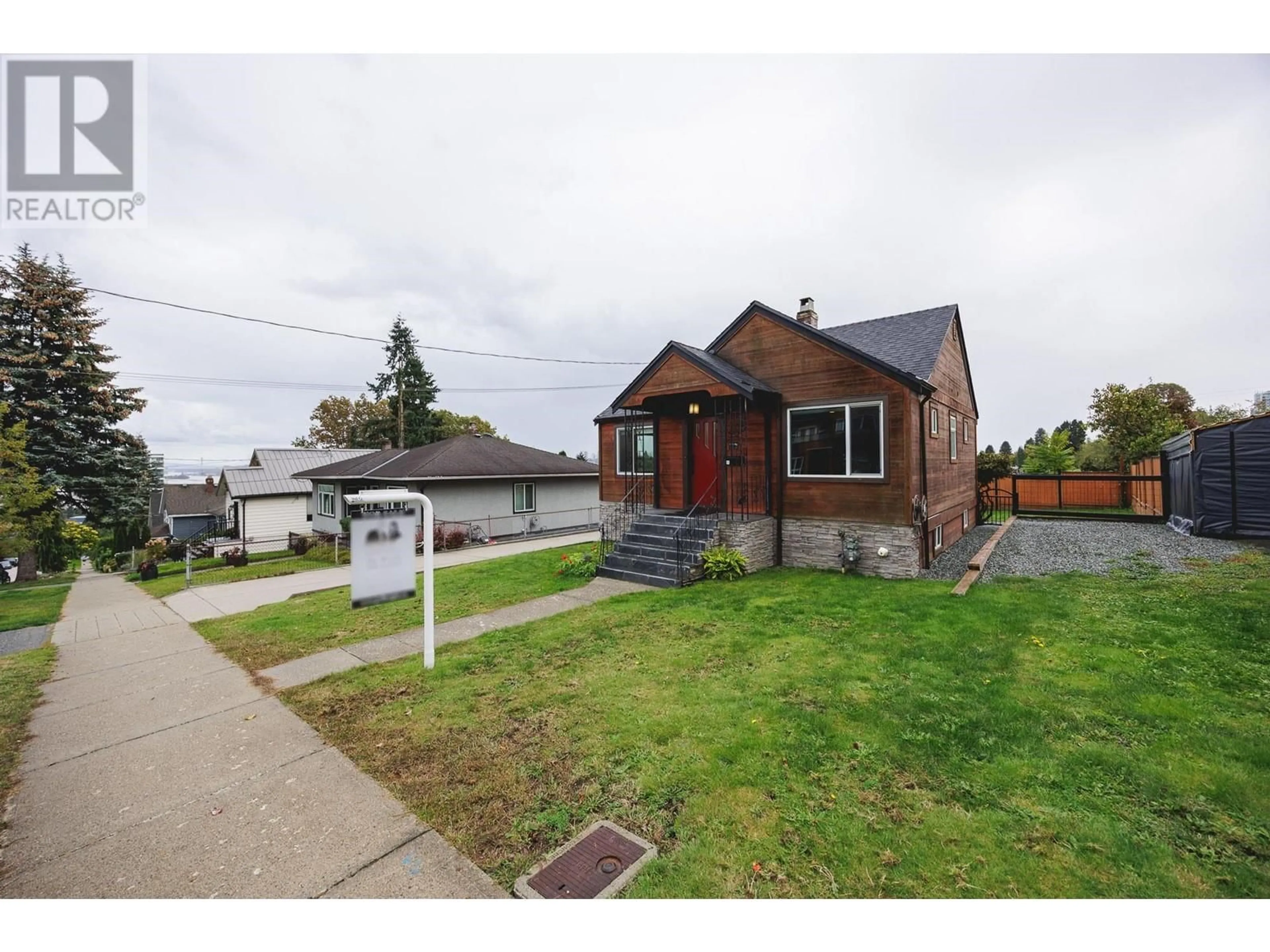 Frontside or backside of a home, the fenced backyard for 362 ALBERTA STREET, New Westminster British Columbia V3L3J4