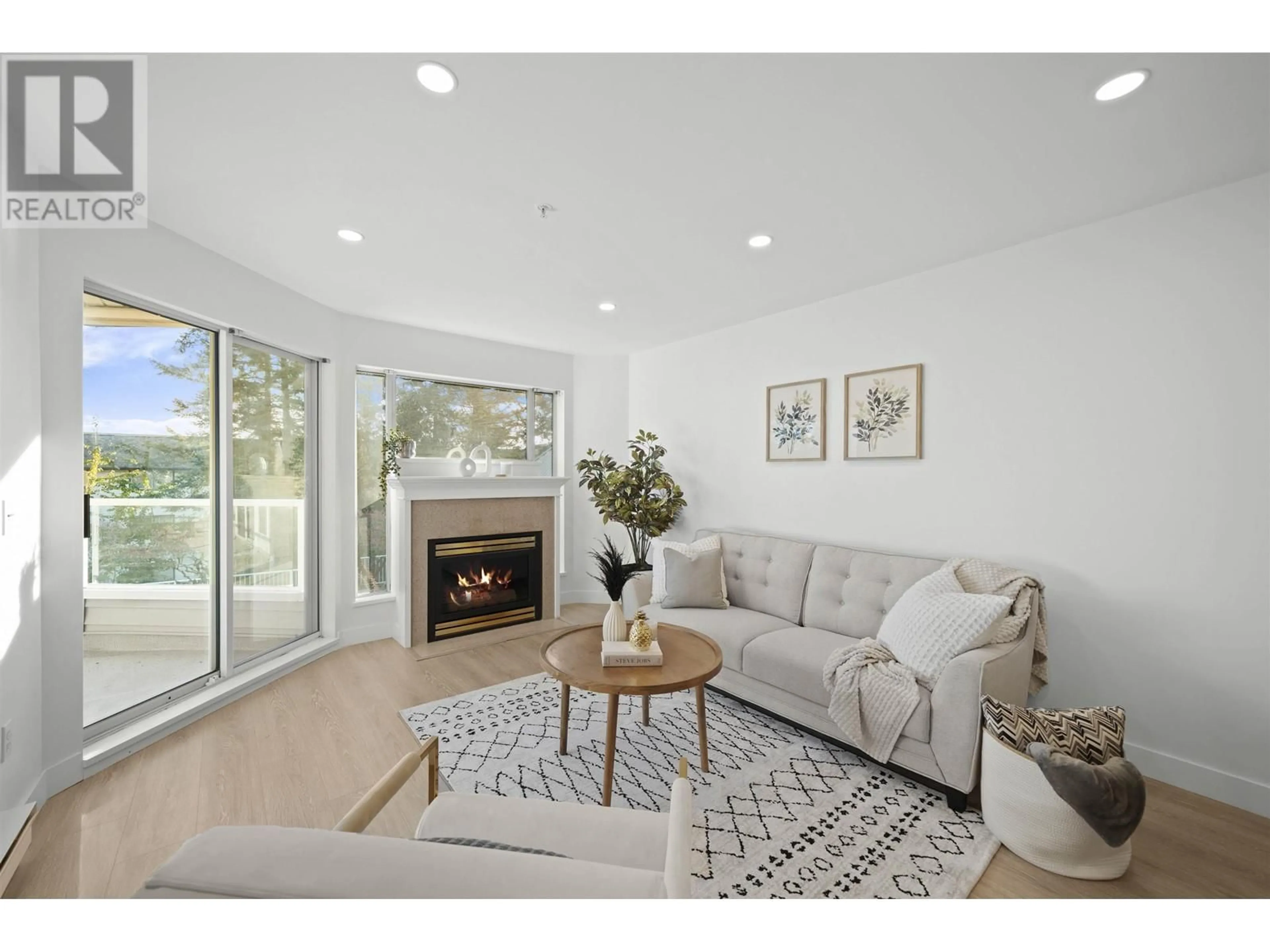 Living room, wood floors for 310 11605 227 STREET, Maple Ridge British Columbia V2X2L6