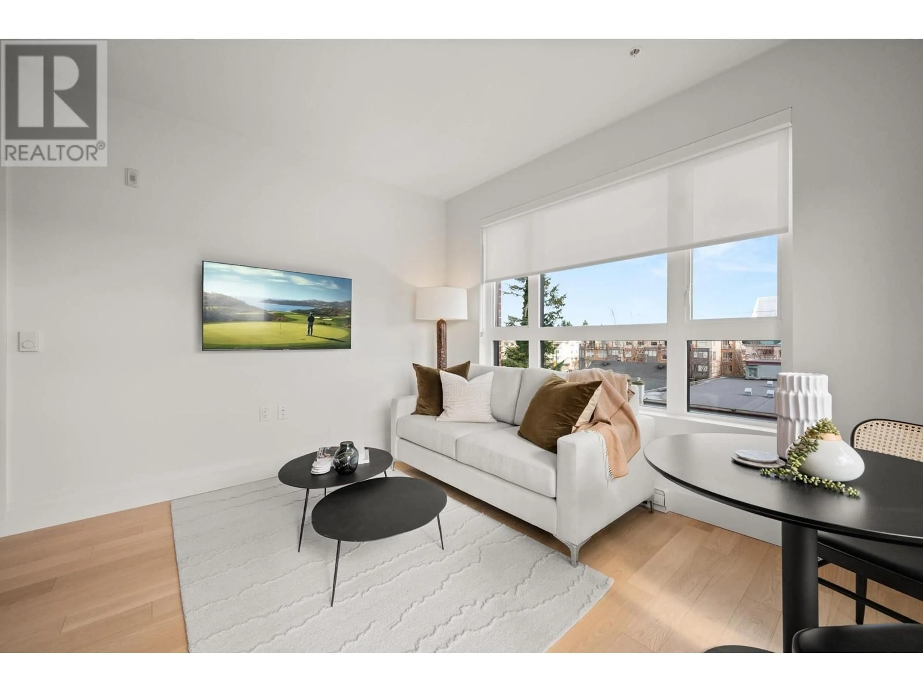 Living room, wood floors for 203 2550 GARDEN DRIVE, Vancouver British Columbia V5N4X6