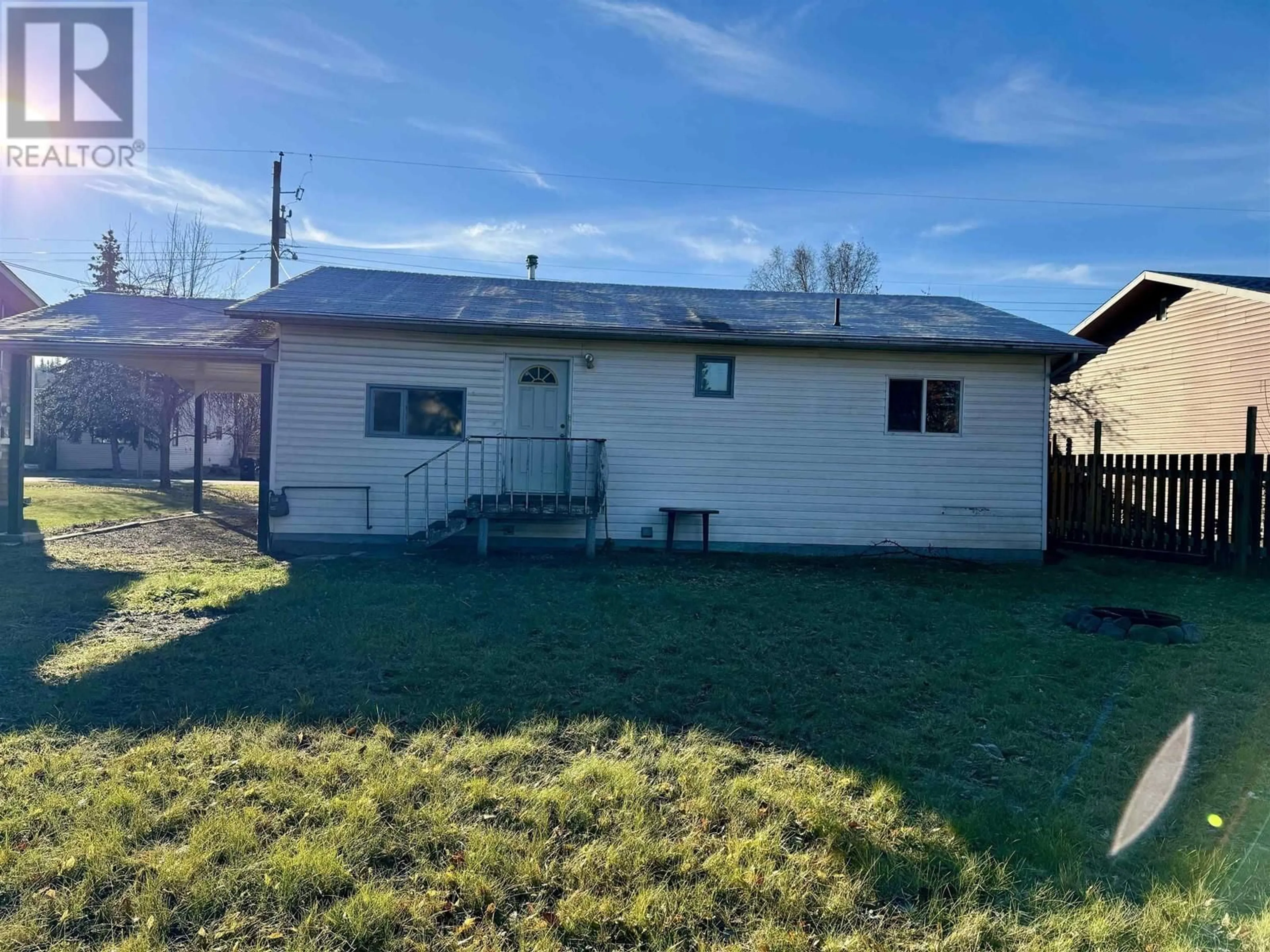 Frontside or backside of a home, the front or back of building for 377 W 2ND STREET, Vanderhoof British Columbia V0J3A0