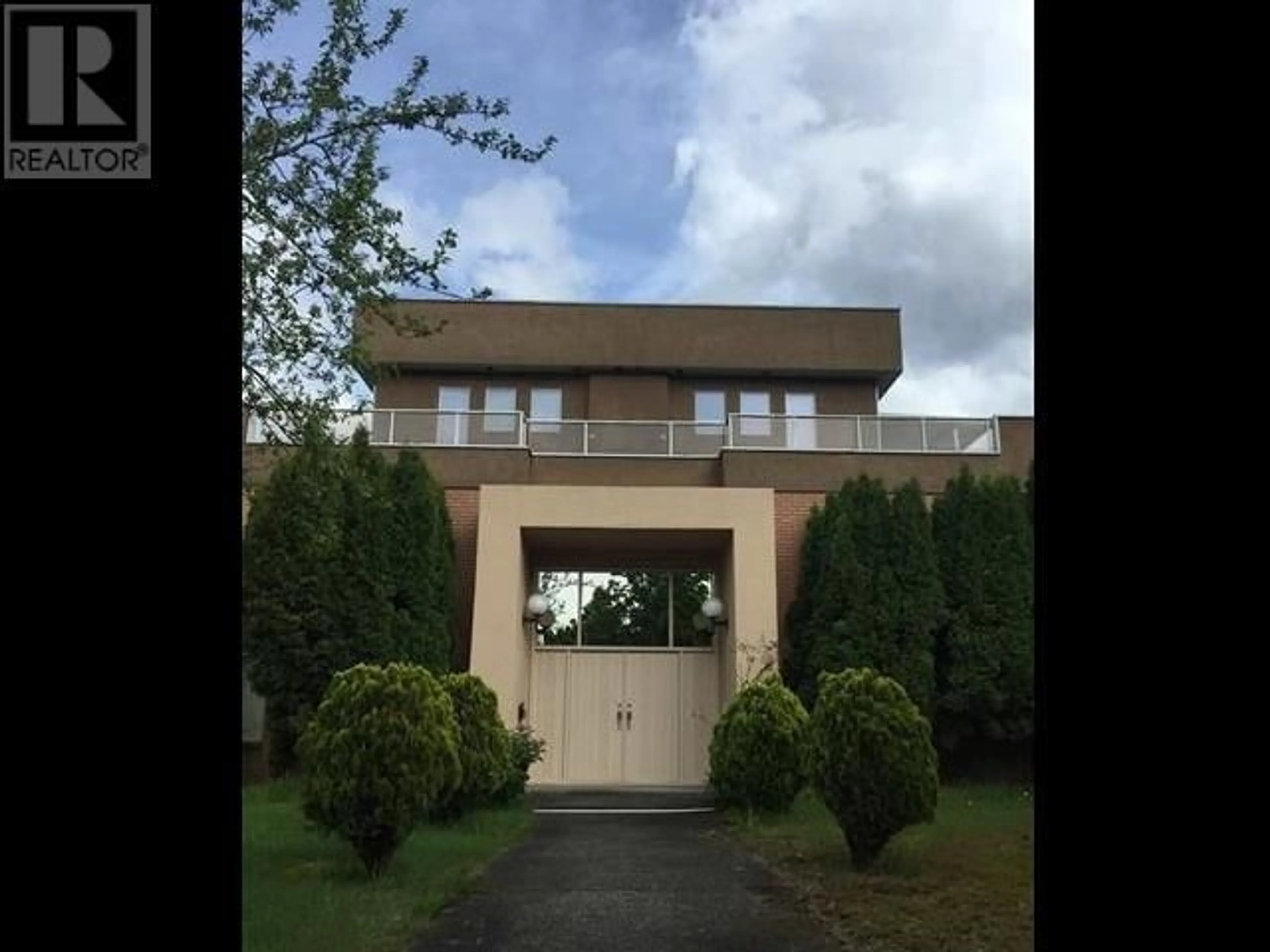 A pic from exterior of the house or condo, the front or back of building for 7498 CARIBOO ROAD, Burnaby British Columbia V3N4A7