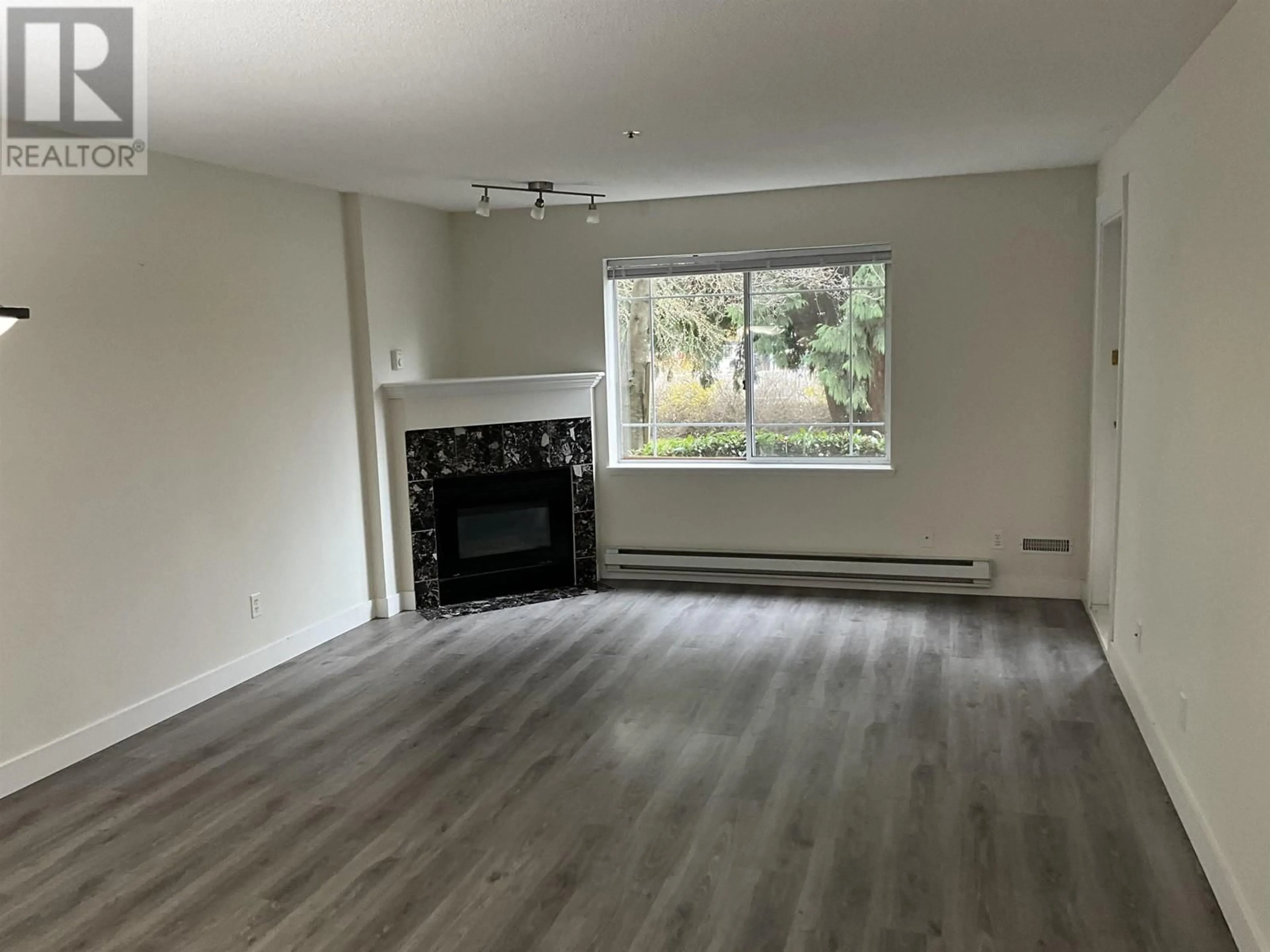 A pic of a room, wood floors for 105 2380 SHAUGHNESSY STREET, Port Coquitlam British Columbia V3C3E3