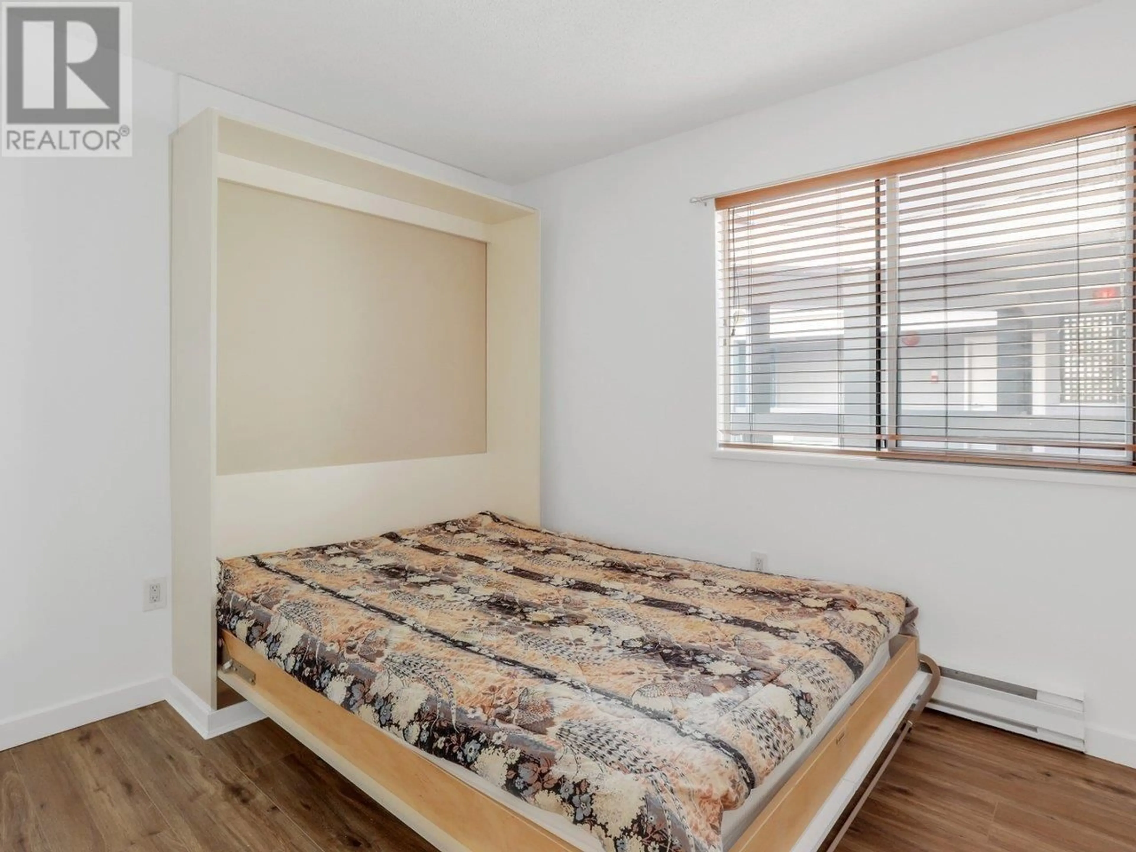 A pic of a room, wood floors for 402 1345 W 4TH AVENUE, Vancouver British Columbia V6H3Y8