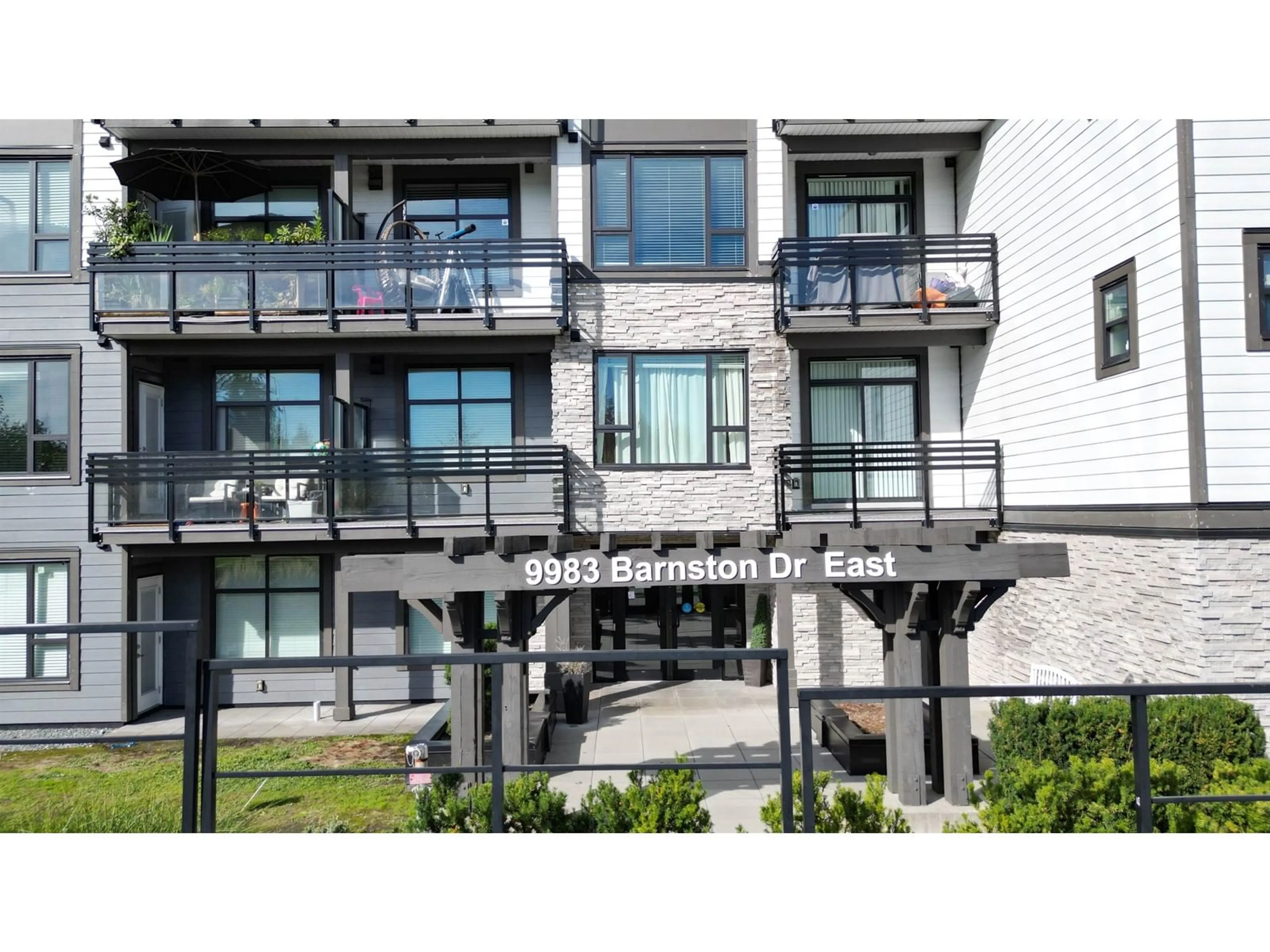 A pic from exterior of the house or condo, the front or back of building for 210 9983 E BARNSTON DRIVE, Surrey British Columbia V4N6T3