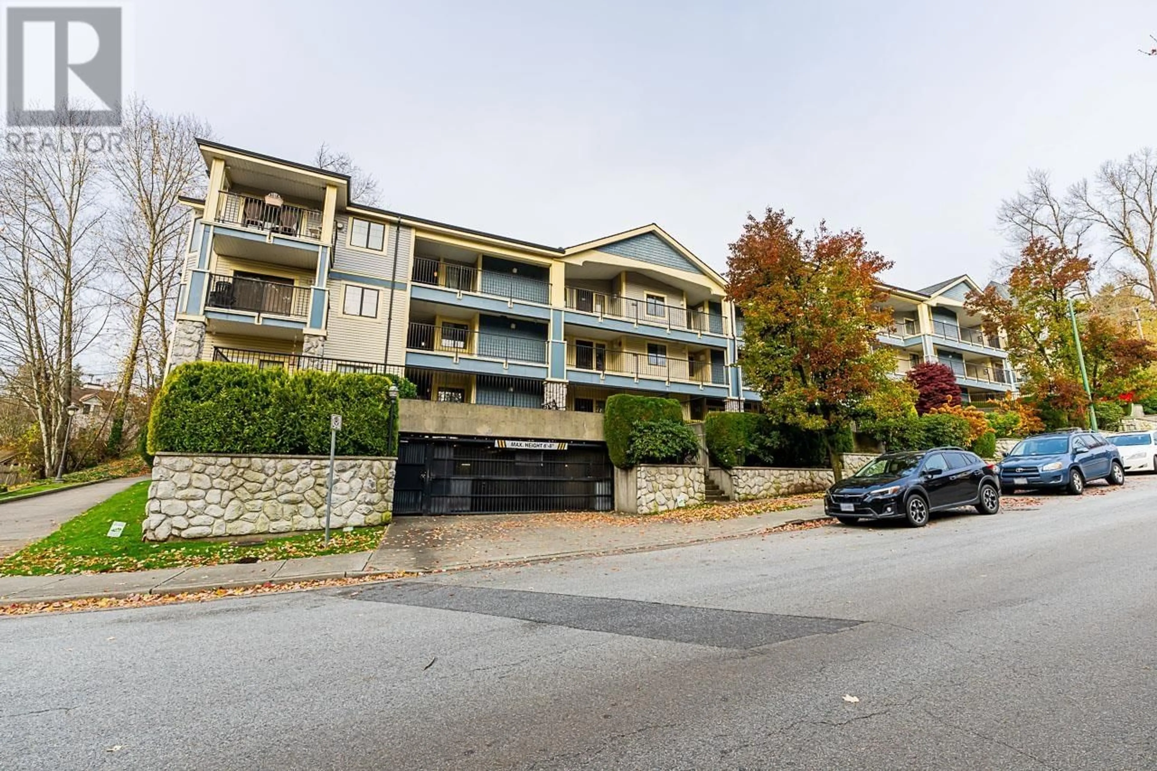 A pic from exterior of the house or condo, the street view for 405 102 BEGIN STREET, Coquitlam British Columbia V3K4V2