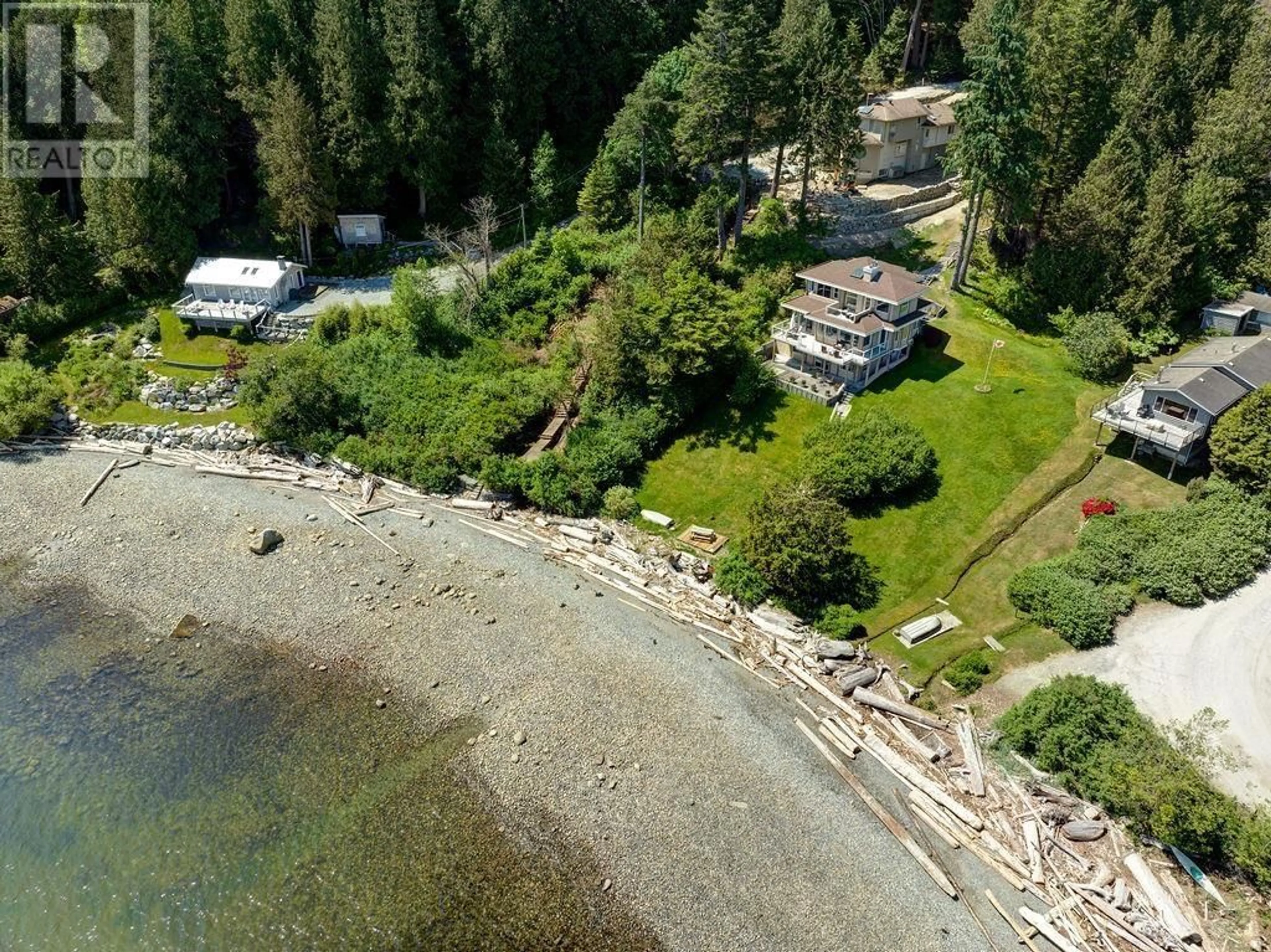 A pic from outside/outdoor area/front of a property/back of a property/a pic from drone, water/lake/river/ocean view for 7659 REDROOFFS ROAD, Halfmoon Bay British Columbia V0N1Y1