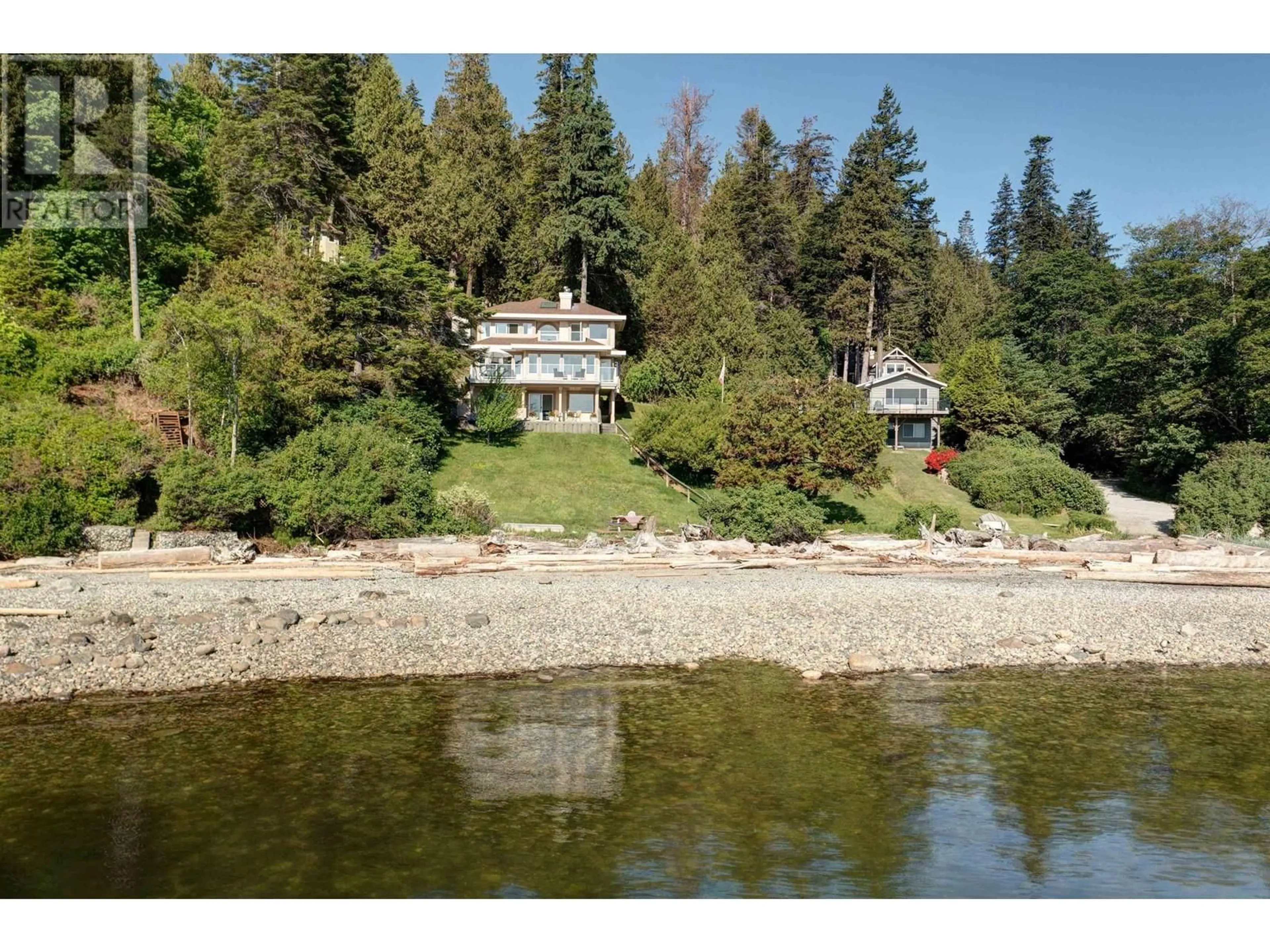 A pic from outside/outdoor area/front of a property/back of a property/a pic from drone, water/lake/river/ocean view for 7659 REDROOFFS ROAD, Halfmoon Bay British Columbia V0N1Y1
