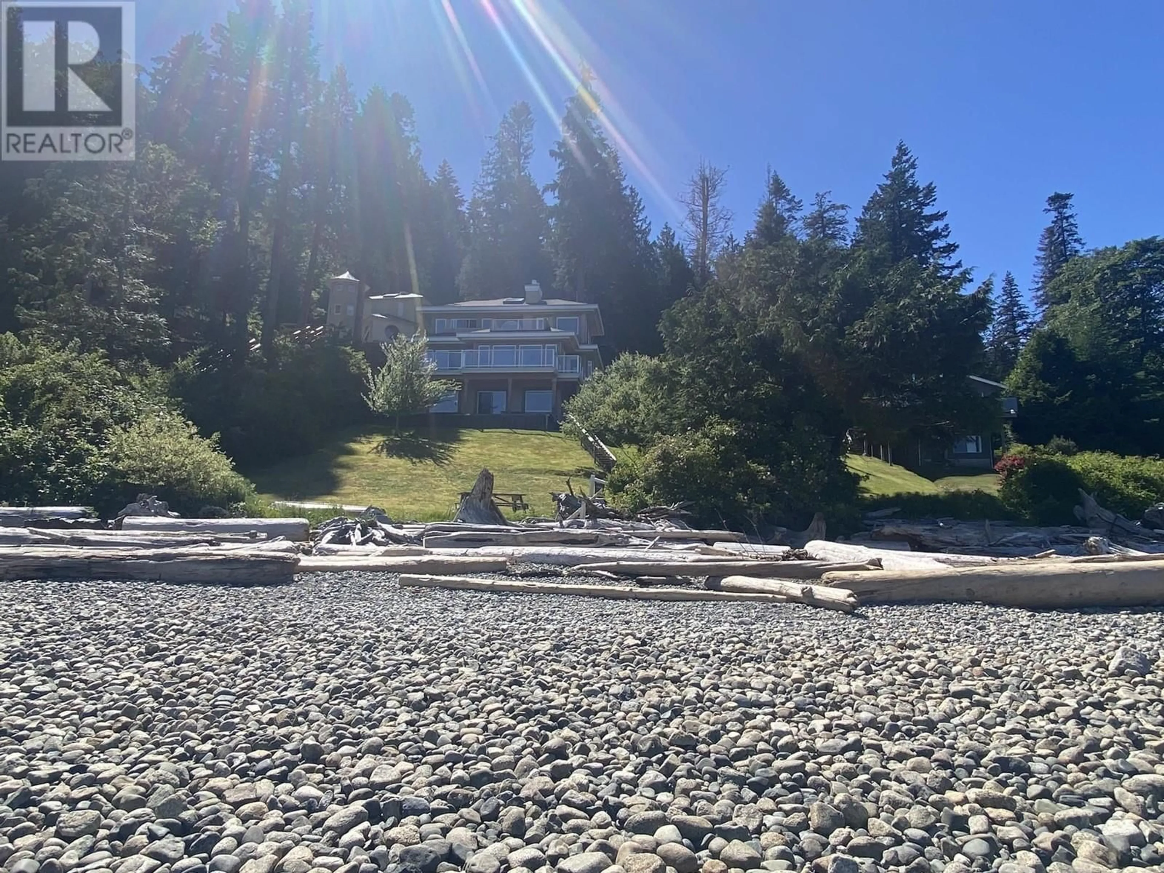 A pic from outside/outdoor area/front of a property/back of a property/a pic from drone, water/lake/river/ocean view for 7659 REDROOFFS ROAD, Halfmoon Bay British Columbia V0N1Y1