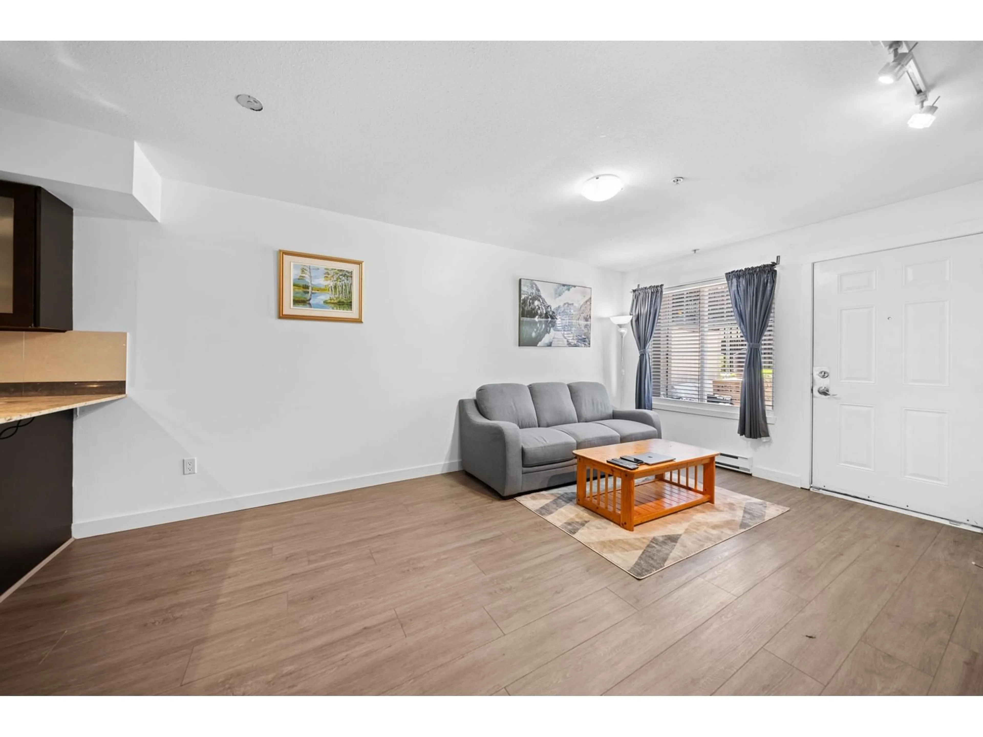 A pic of a room, wood floors for 110 13958 108 AVENUE, Surrey British Columbia V3T0B4