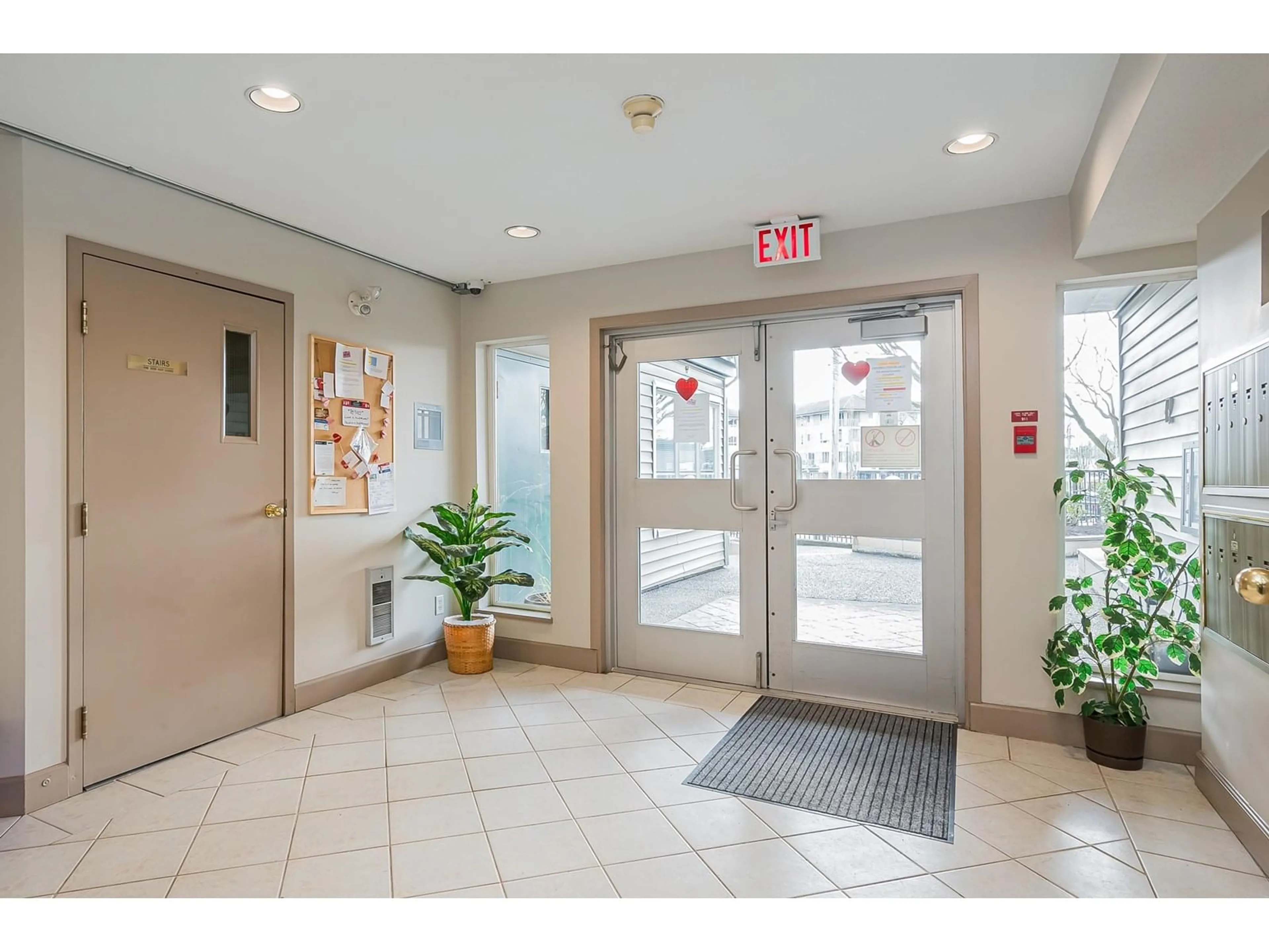 Indoor foyer for 418 5765 GLOVER ROAD, Langley British Columbia V3A8M8