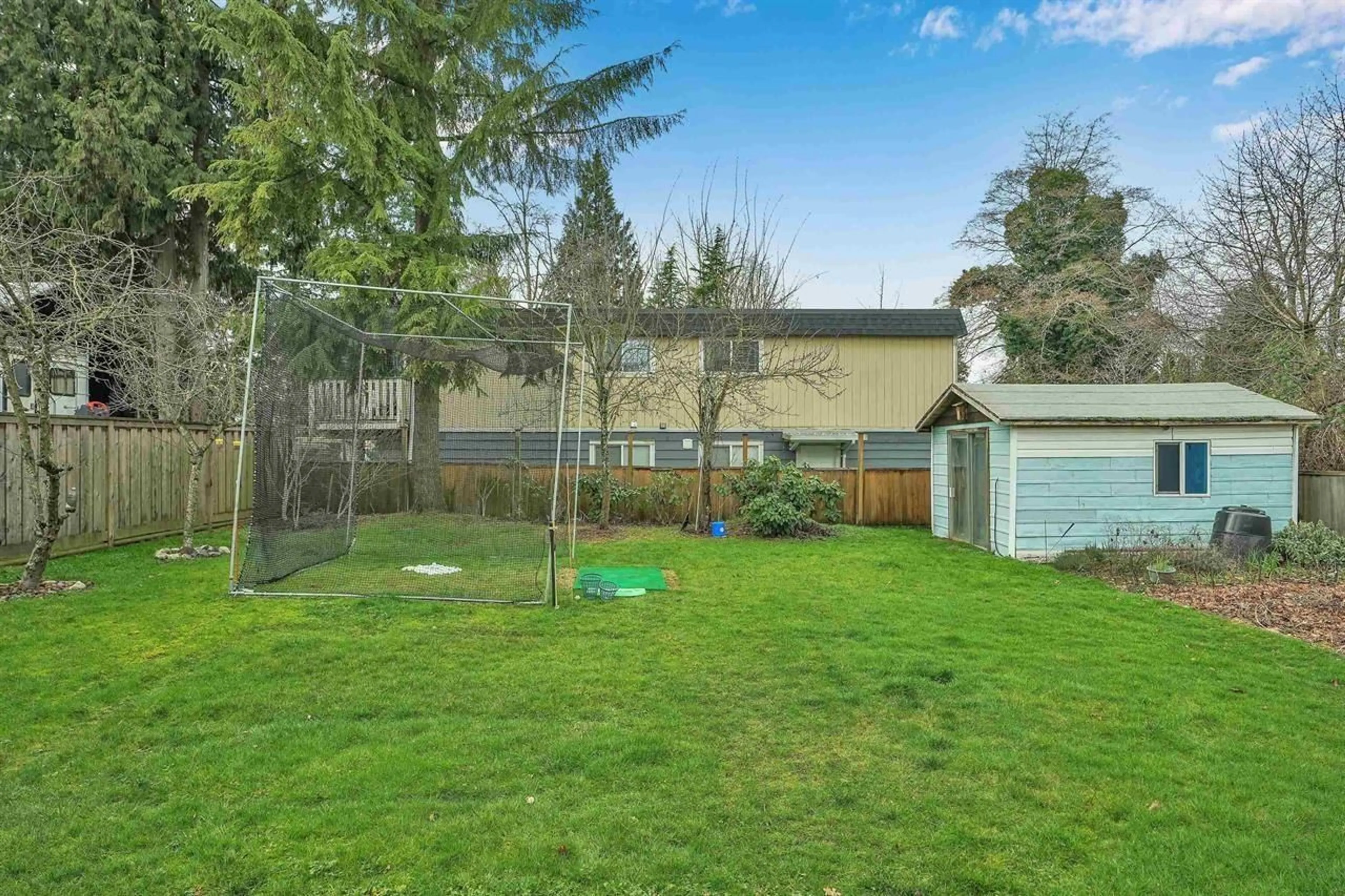 A pic from exterior of the house or condo, the fenced backyard for 10263 MICHEL PLACE, Surrey British Columbia V3T3R1