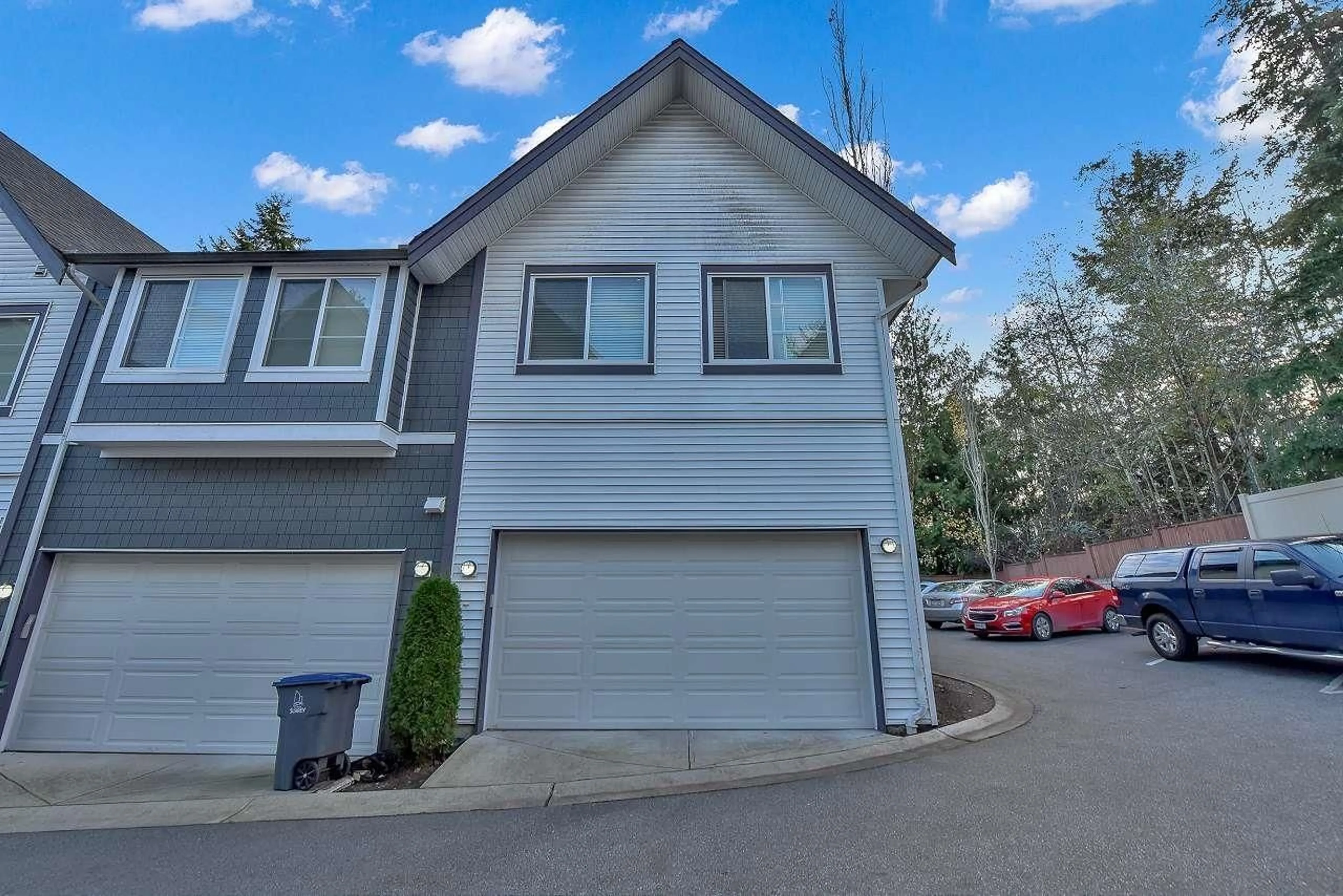 A pic from exterior of the house or condo, the street view for 11 6767 196 STREET, Surrey British Columbia V4N6R2