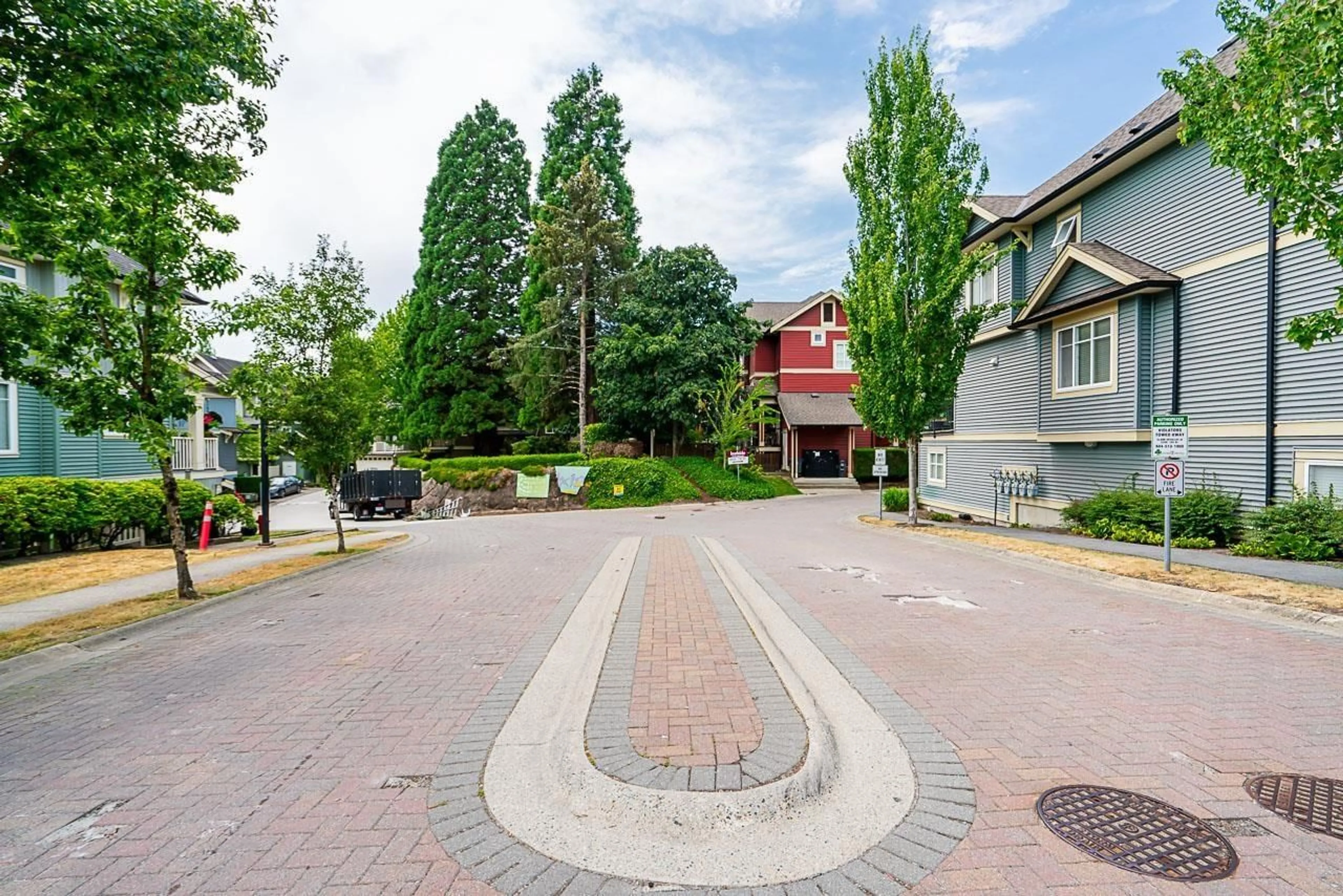 A pic from exterior of the house or condo, the street view for 12 6575 192 STREET, Surrey British Columbia V4N5T8