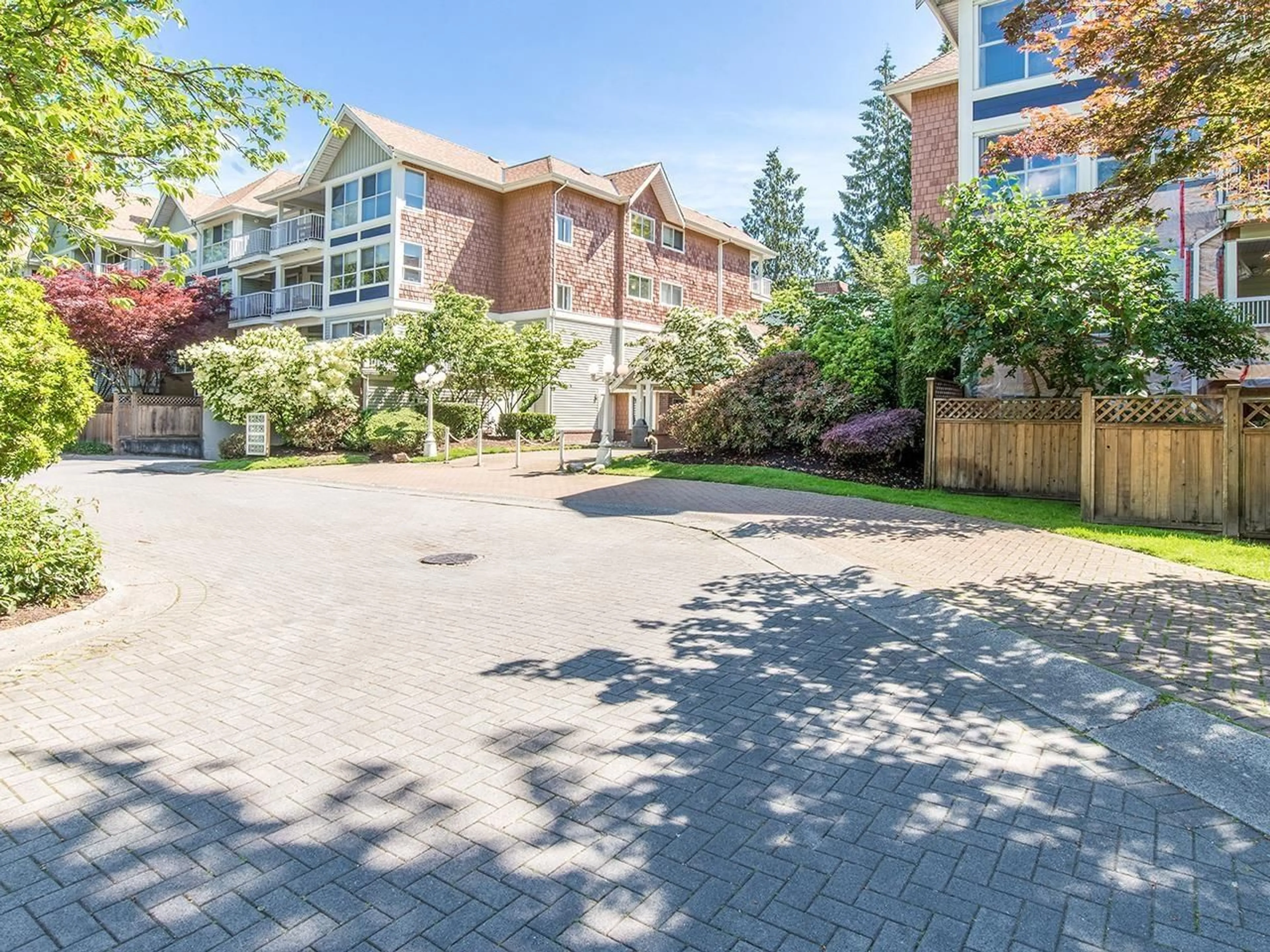 A pic from exterior of the house or condo, the street view for 106 9650 148 STREET, Surrey British Columbia V3R0W2