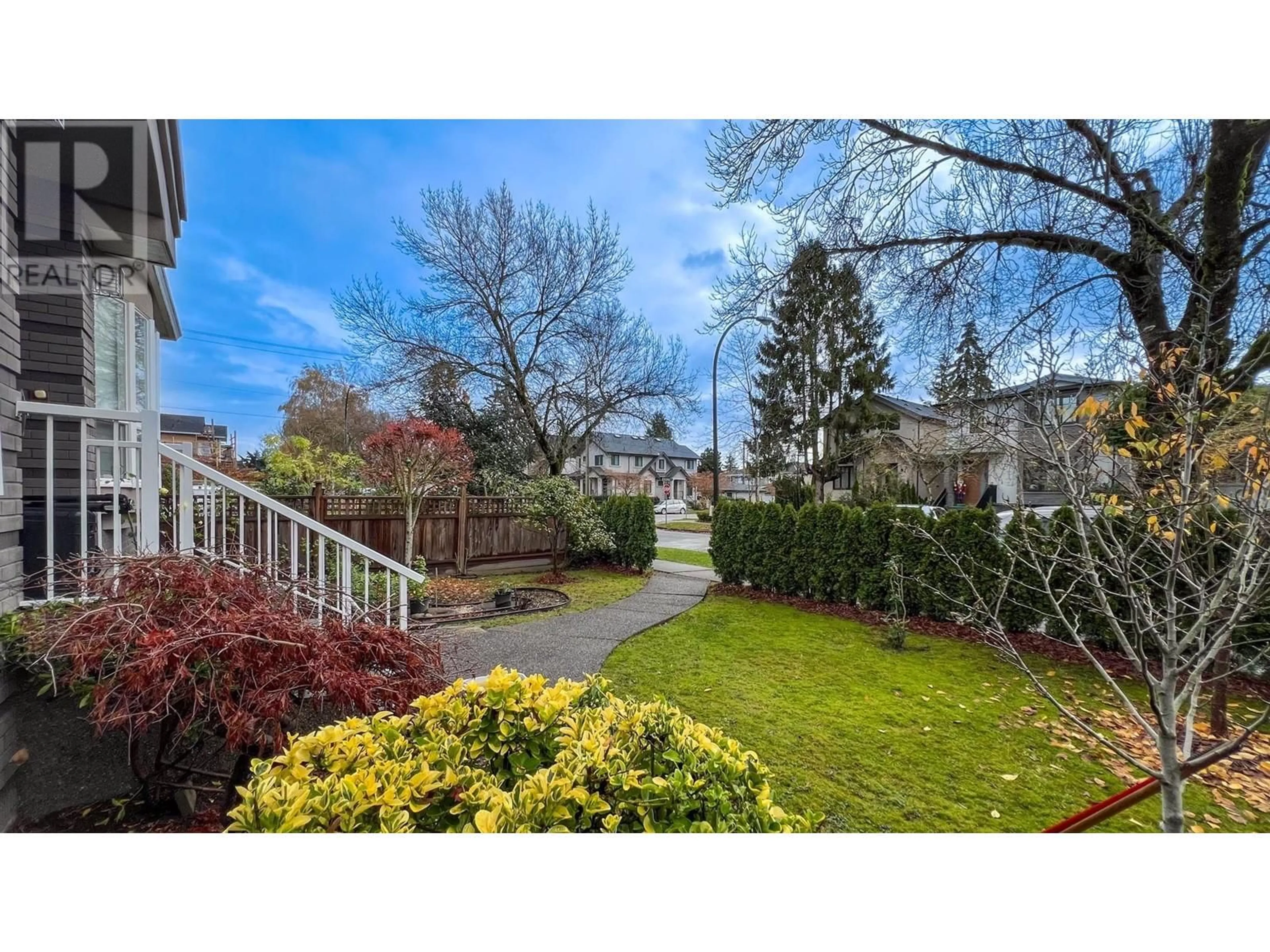 A pic from exterior of the house or condo, the fenced backyard for 2813 W 21ST AVENUE, Vancouver British Columbia V6L1K5